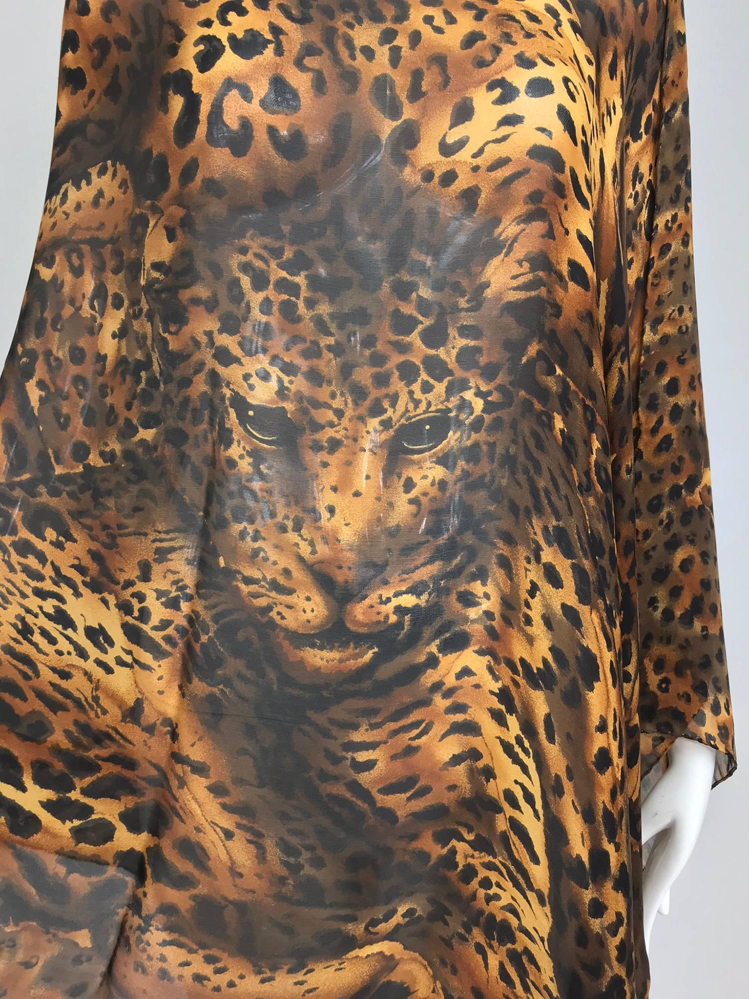 Yves Saint Laurent large leopard silk chiffon shawl or scarf...This large scarf can be used as a shawl or wrap...Beautiful full body leopard printed across the scarf...Silk chiffon, looks barely, if ever worn...Approximately 34 1/2