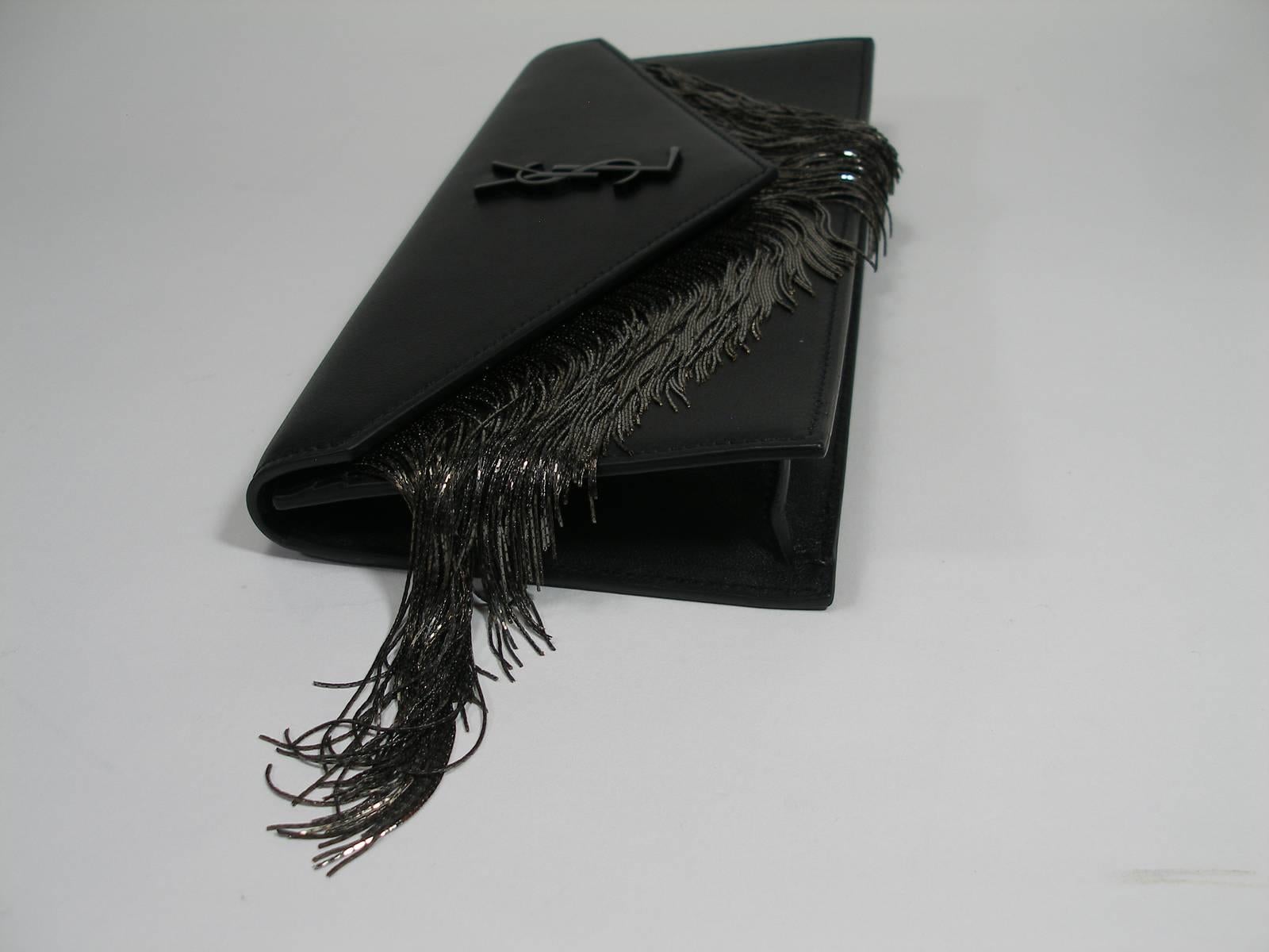 Black Yves Saint Laurent Le Sept Fringed Pouch in black leather / SOLD OUT in shop YSL For Sale