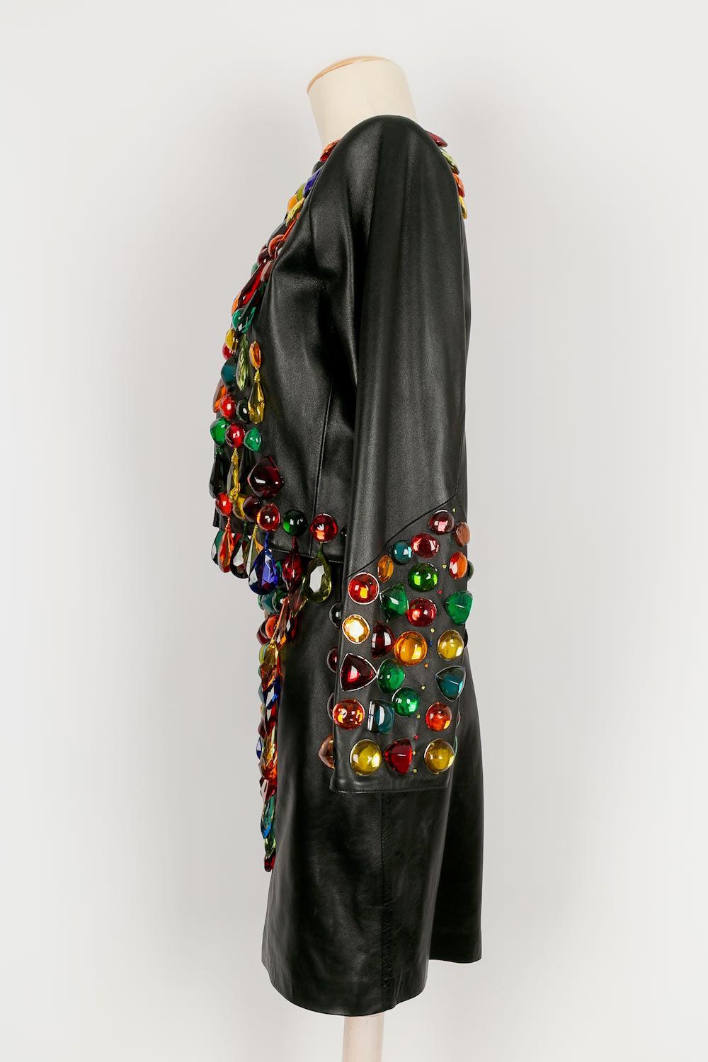 Noir Costume en cuir avec pompons Yves Saint Laurent, 1990 en vente