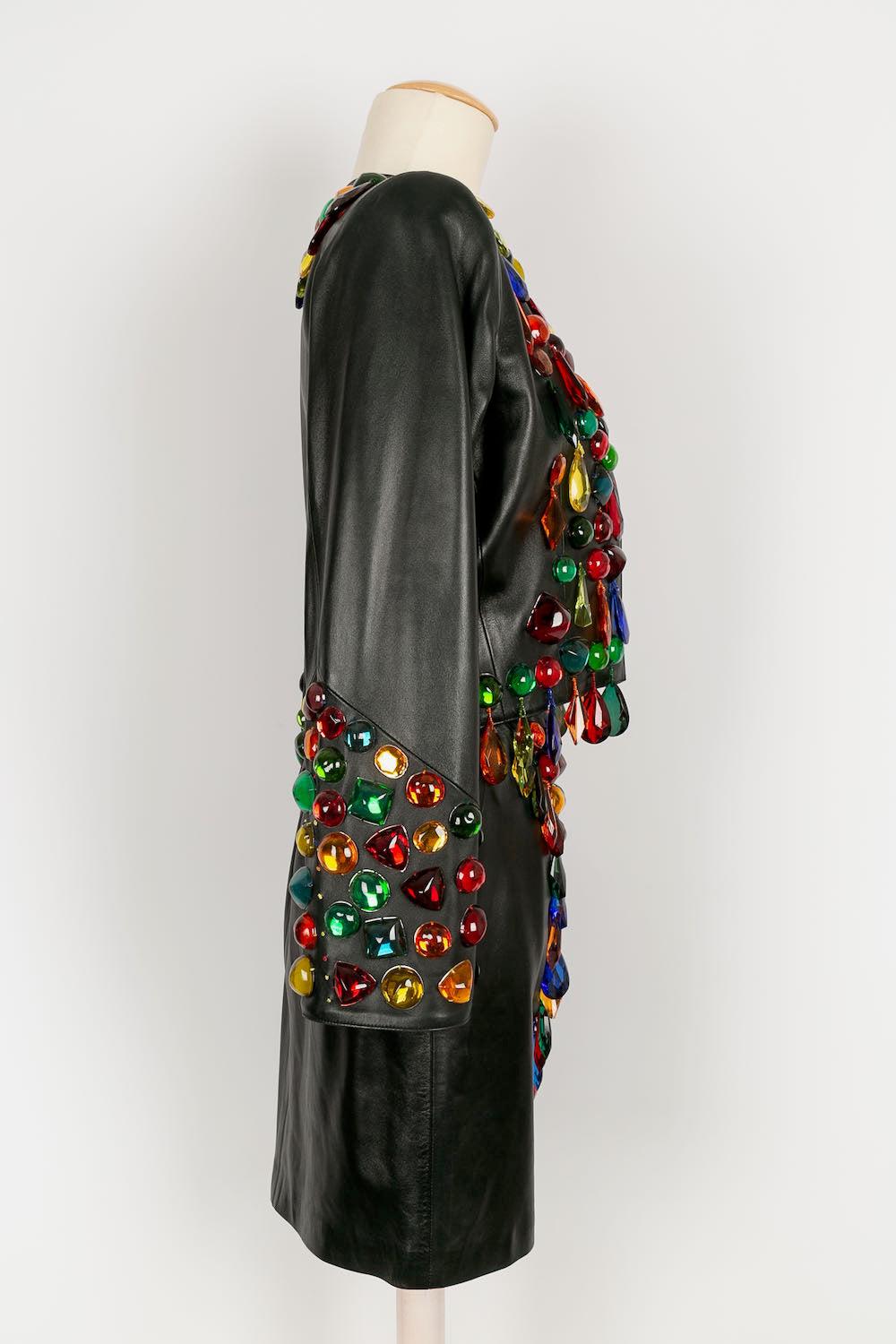 Costume en cuir avec pompons Yves Saint Laurent, 1990 en vente 1