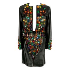 Yves Saint Laurent Traje de cuero con borlas, 1990