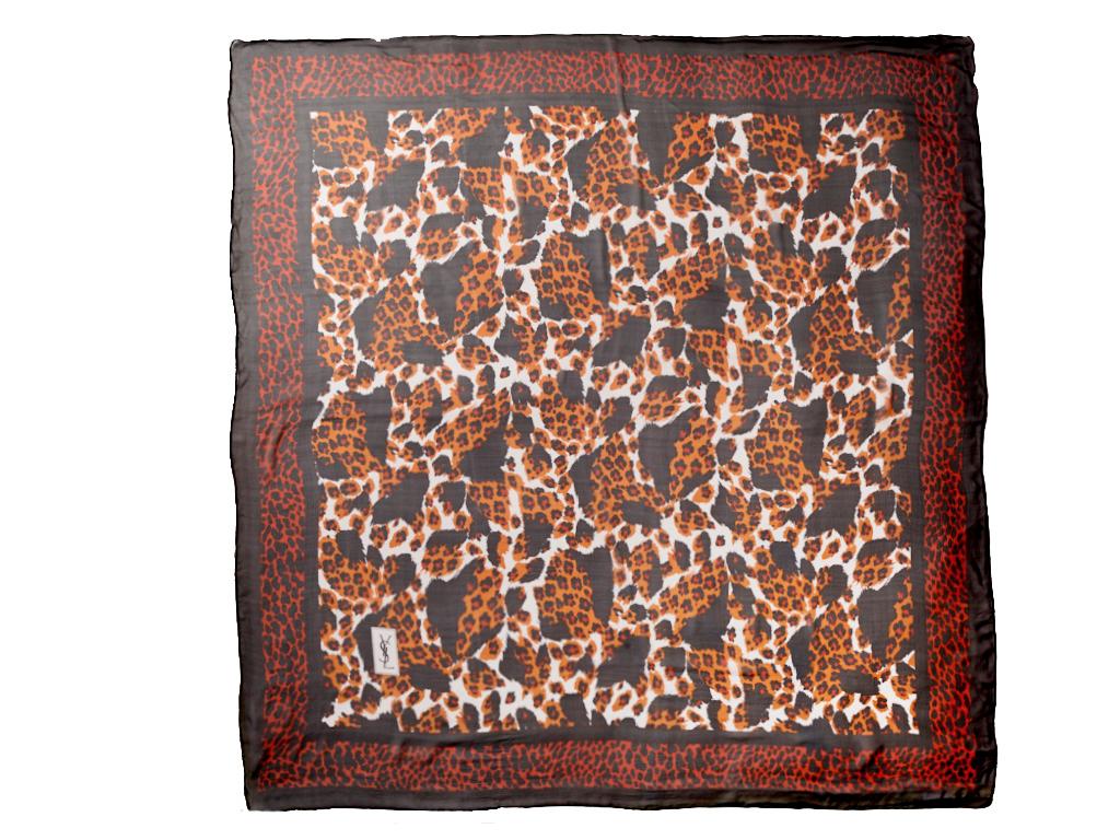 Yves Saint Laurent, Rive Gauche, large size, silk chiffon leopard print scarf, having mixed leopard patterns on the interior and borders of the scarf. Dominant tones are deep umber, black and pale grey.  