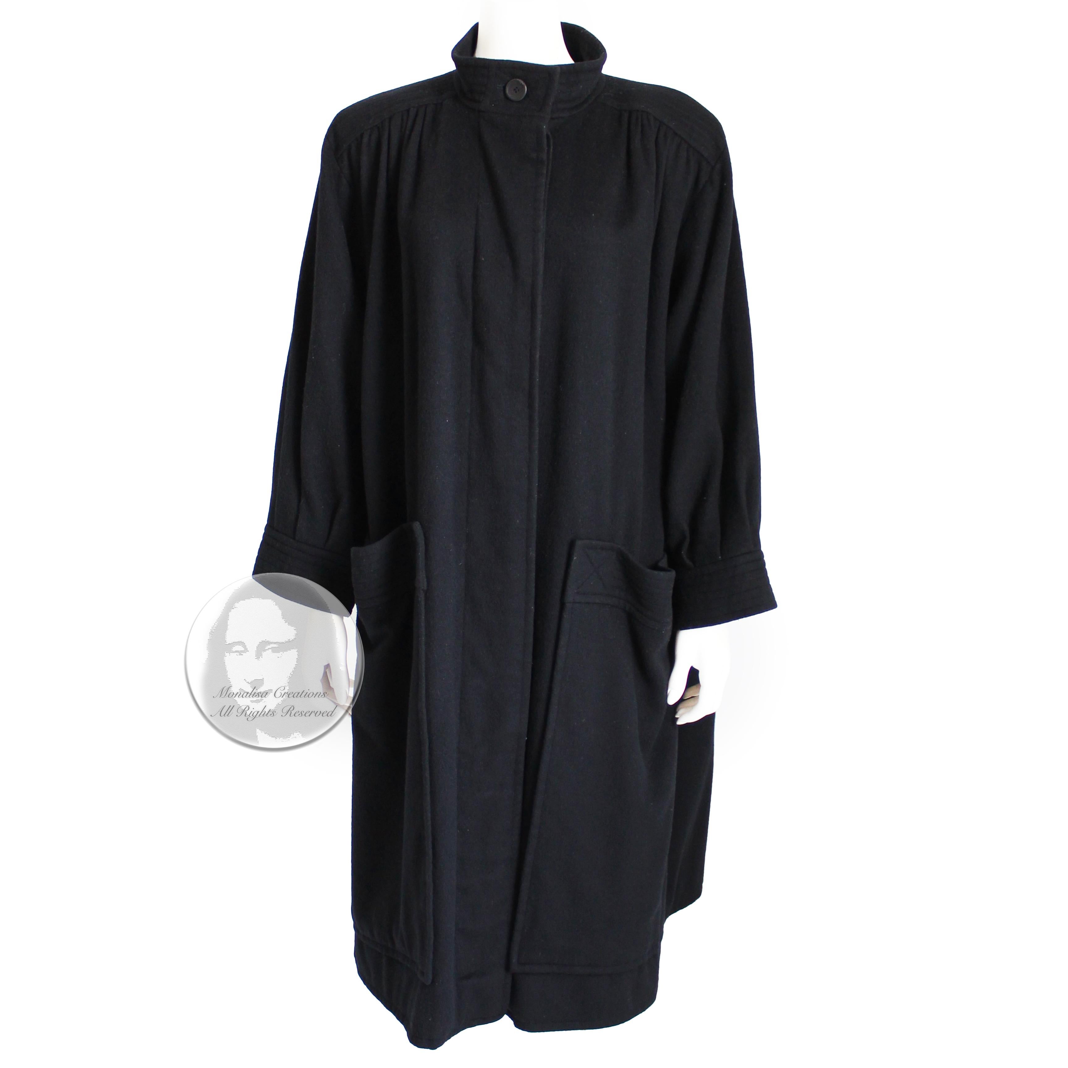 Authentic, preowned, vintage Yves Saint Laurent Rive Gauche long black wool coat, likely made in the late 70.. 

Made from a supple black wool, it features shoulder pads under the lining and an oversized pocket at each hip.  It fastens with five