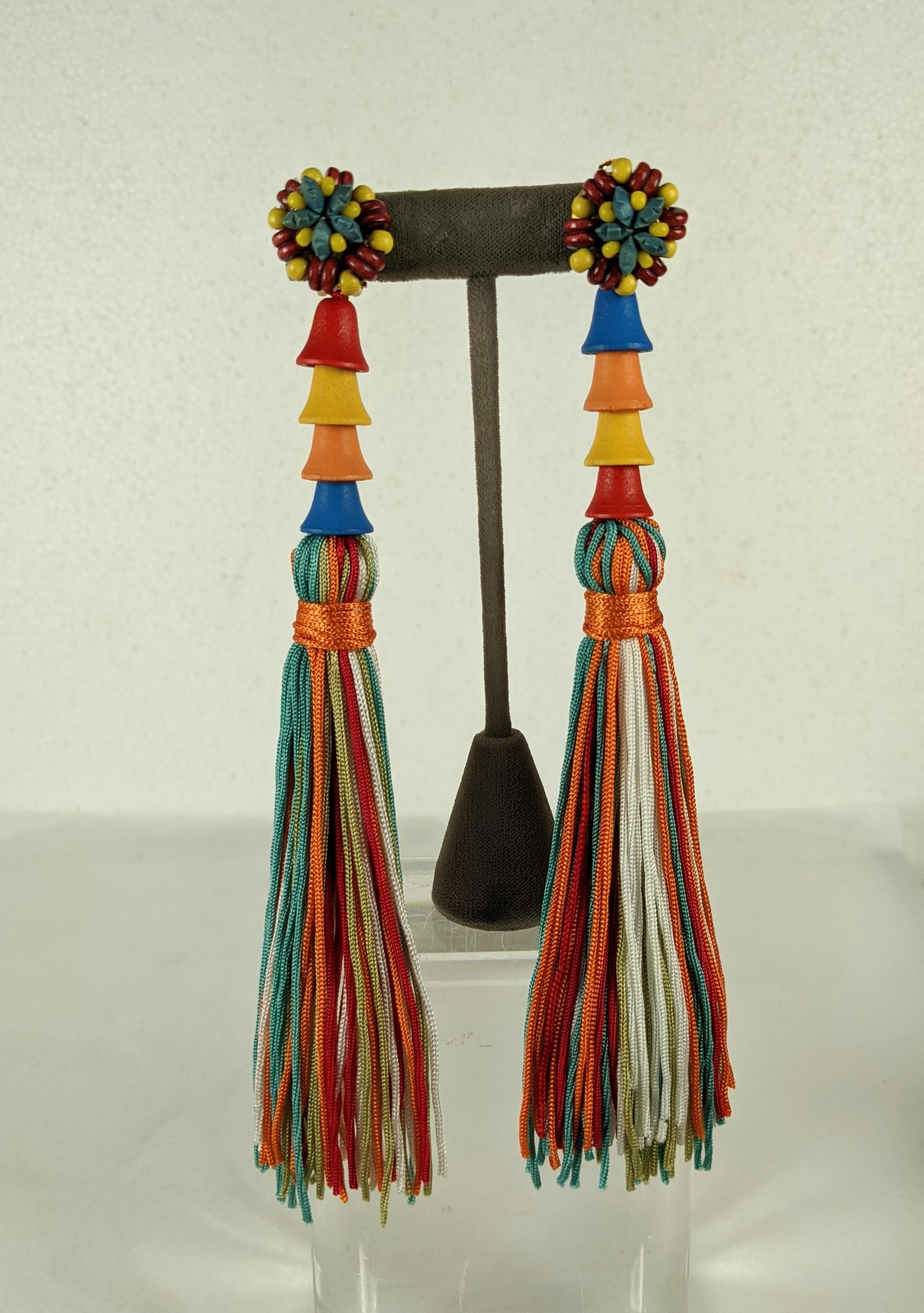 Yves Saint Laurent Long Earrings spring summer 1980. Composed of painted, stained and lacquered wood with long multi colored silk tassels.
Excellent condition, signed Made in France. Unsigned YSL. 
Length 7 