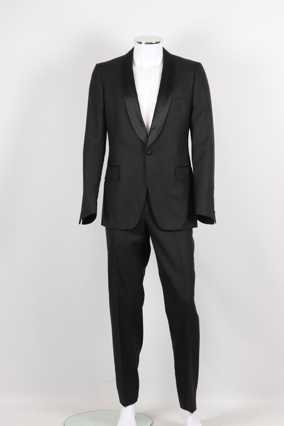 Yves Saint Laurent men's satin trimmed wool two piece suit. Black. Long sleeve, v-neck. Button fastening at front, hook and eye fastening at front. Jacket: 100% wool; lining: 100% silk. Pants: 100% viscose. Size: IT 50 (Large, EU 50, UK/US Chest 40)