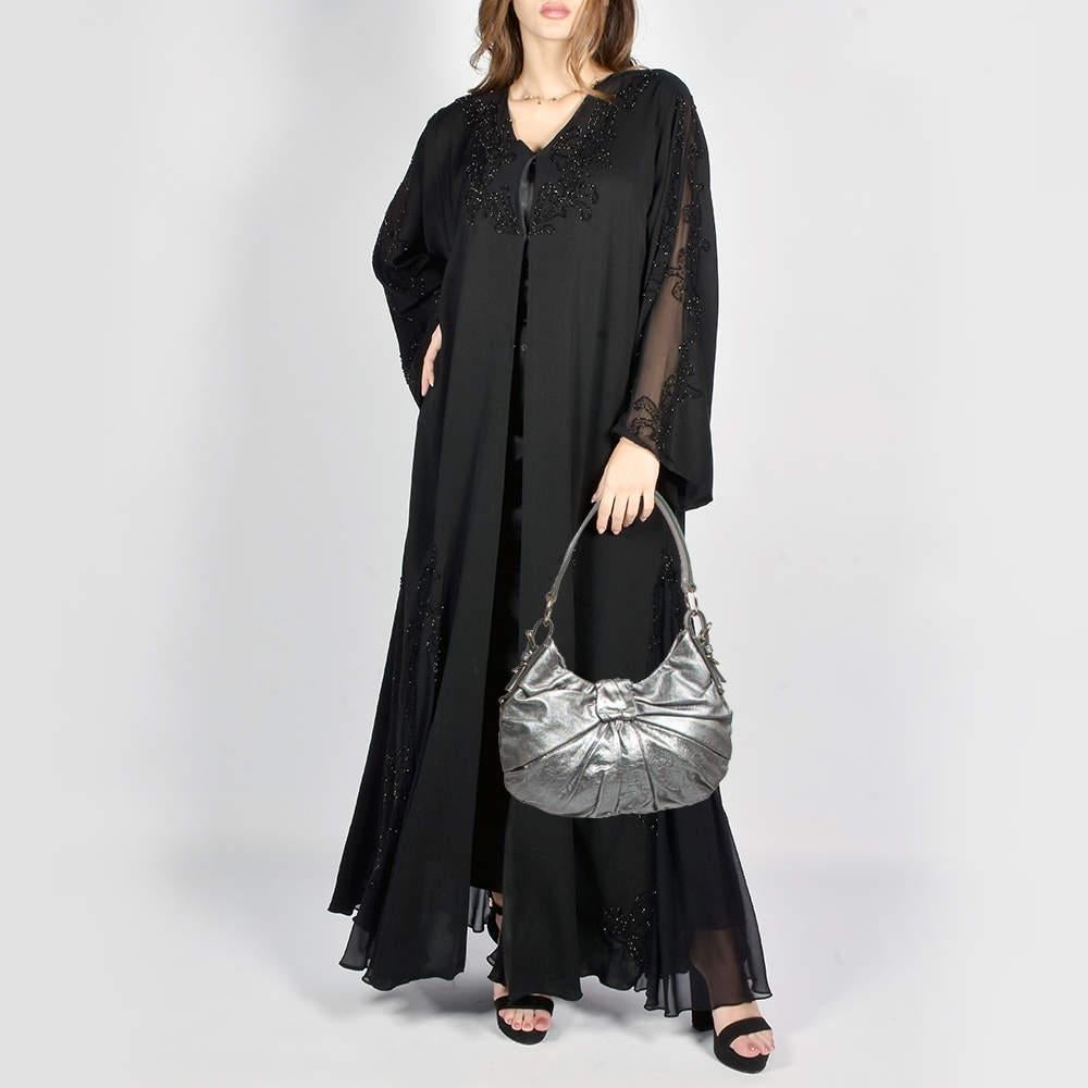 Stylish handbags never fail to make a fashionable impression. Make this designer hobo yours by pairing it with your sophisticated workwear as well as chic casual looks.