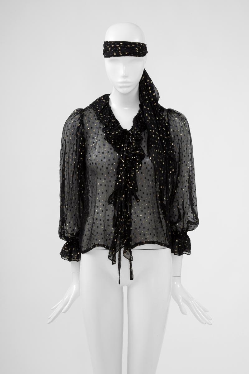This 70's ruffled boho blouse is constructed of lightweight black silk chiffon woven with gold metallic 