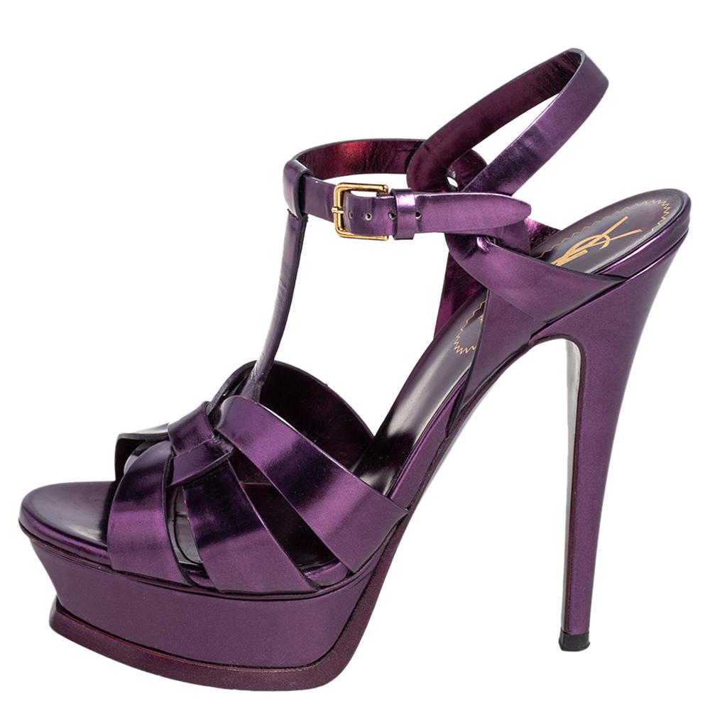 One of the most sought-after designs from Saint Laurent is their Tribute sandals. They are such a craze amongst fashionistas around the world, and it is time you own one yourself. These purple ones are designed with metallic leather straps, ankle