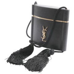 Yves Saint Laurent Minaudière à Pompons cuir et métal doré 