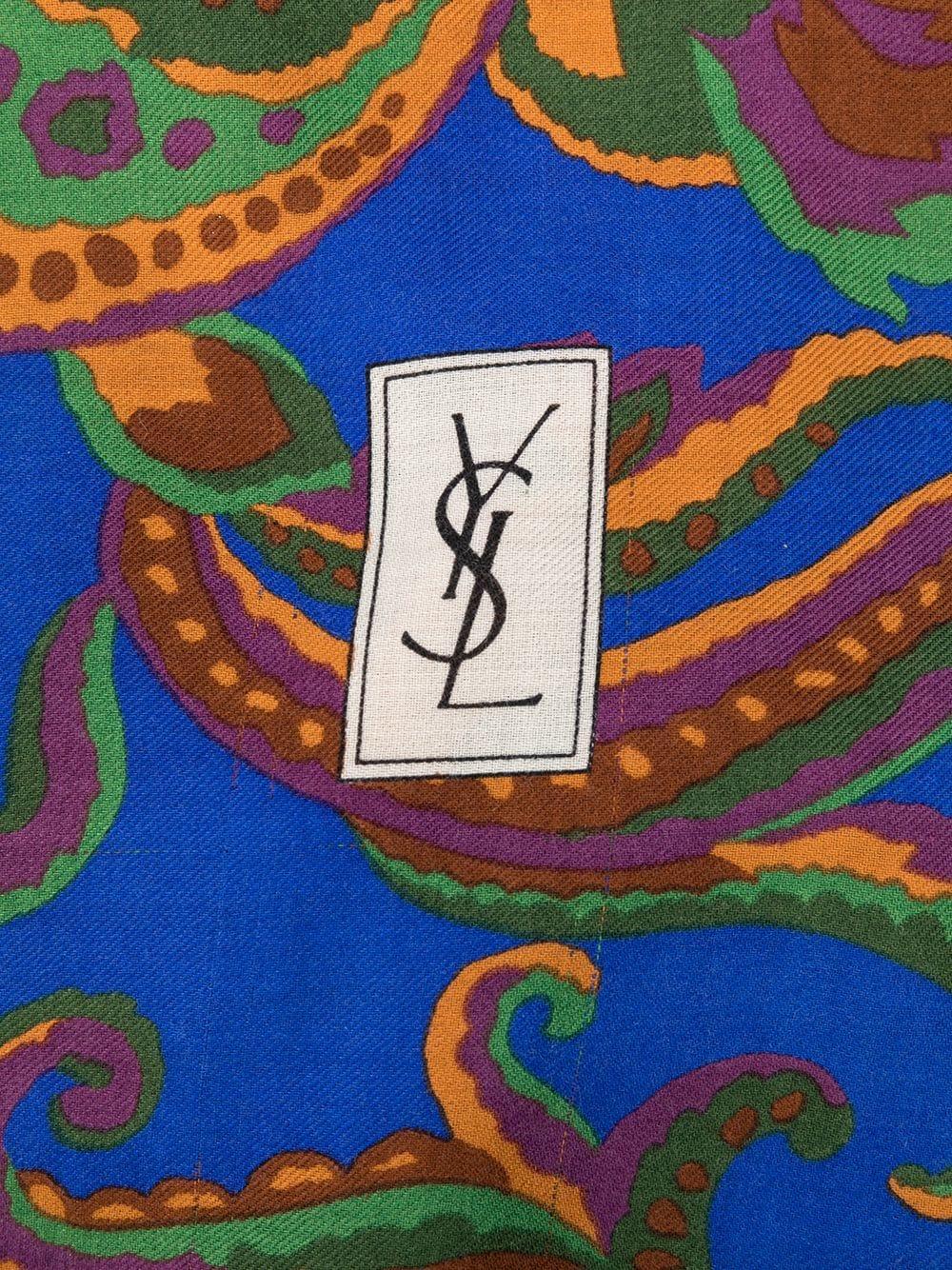 Yves Saint Laurent large silk and wool scarf featuring green, blue, yellow all-over floral print, frayed edge, a printed logo on. 50% wool & 50% silk
In excellent vintage condition. Made in France.
53.1in. (135cm) X 44 in.53.1in. (135cm)
We
