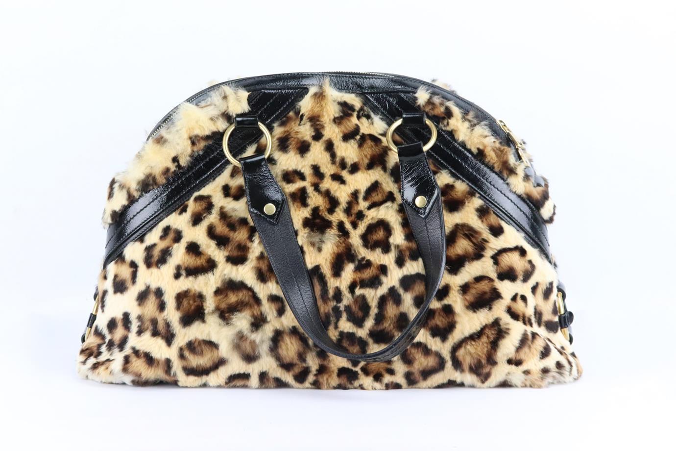 Yves Saint Laurent Muse large leopard print fur shoulder bag. Made from beige, brown and black leopard-print rabbit fur with black patent-leather trim and gold-tone hardware, it has a large interior compartment with zipped pocket. Beige, black and