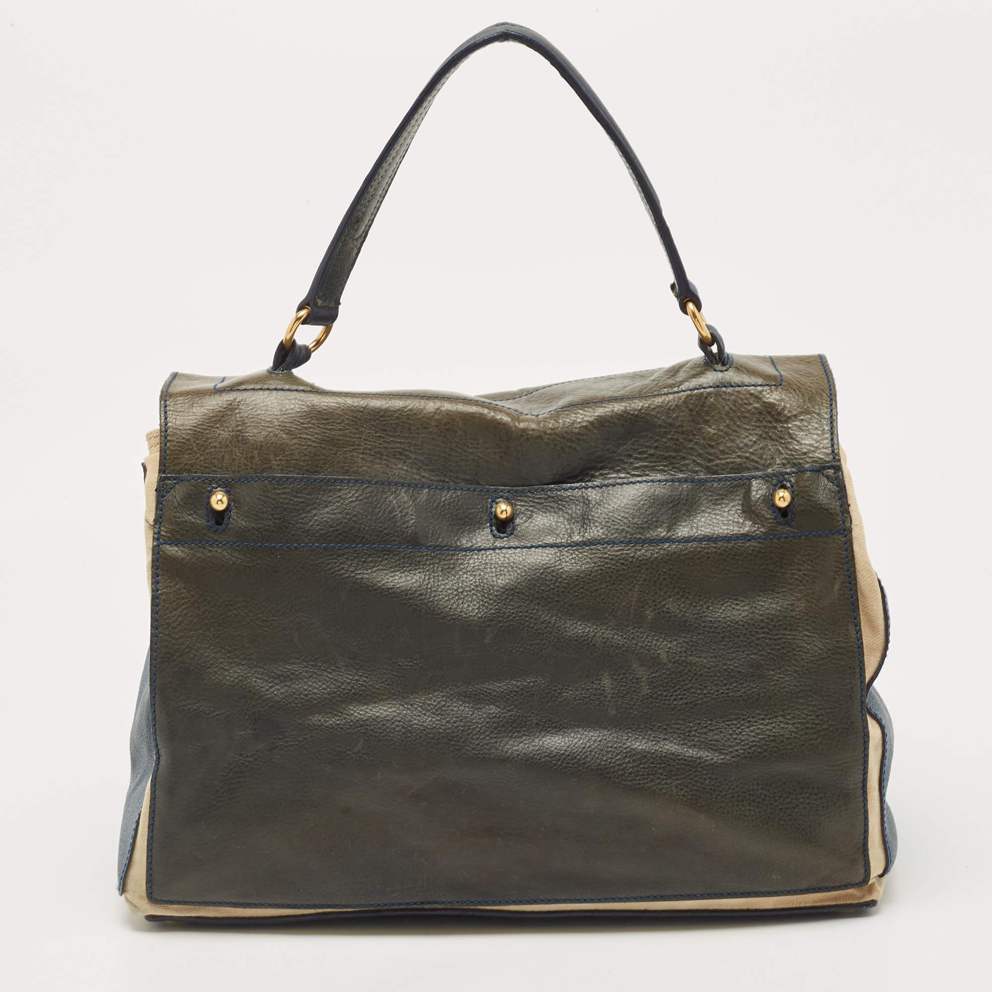 Exuding unparalleled elegance and sophistication, this bag is made from the finest material in a gorgeous hue. While the roomy interior offers ample space, the top handle allows you to carry it with much elegance.

