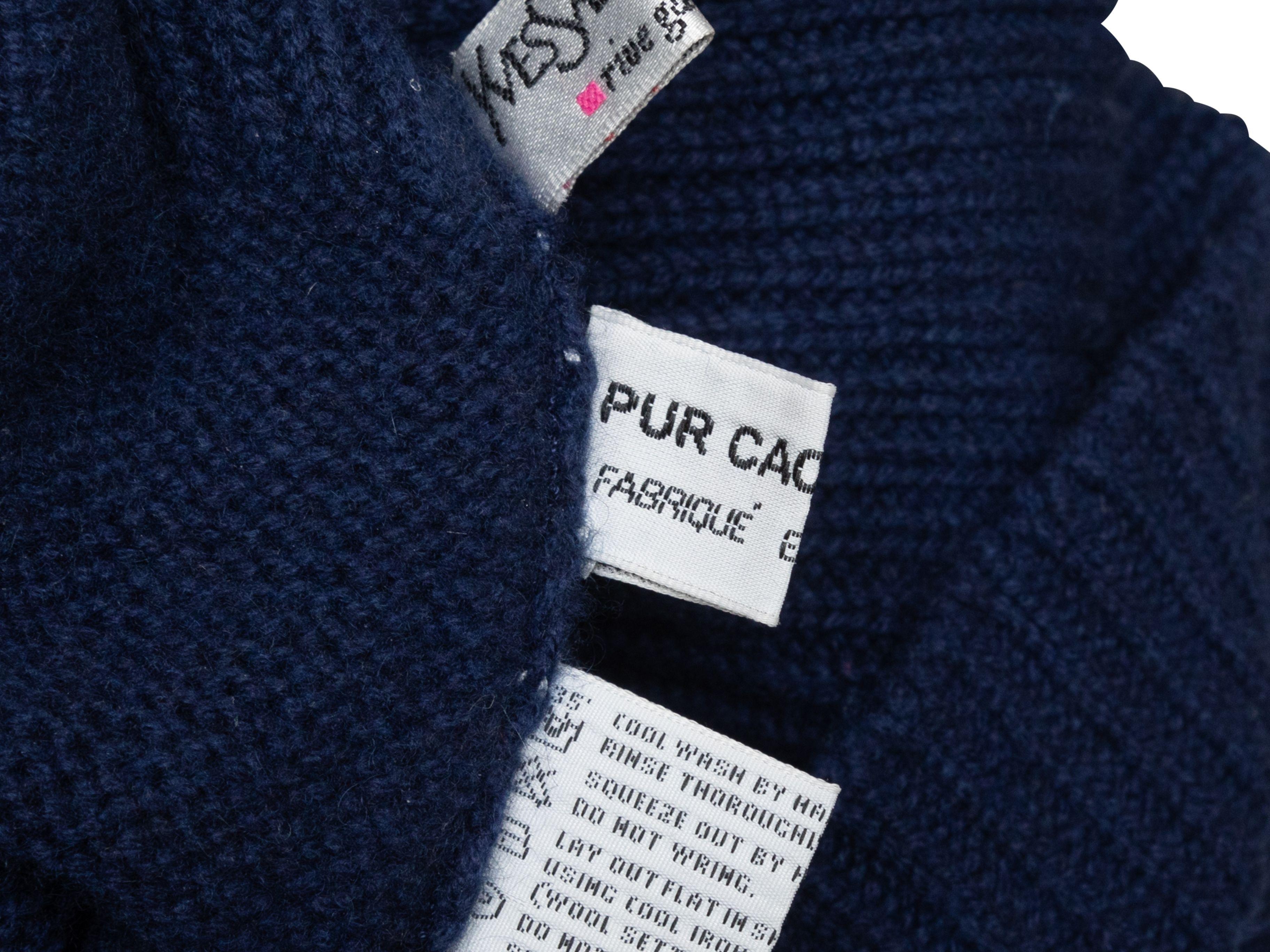 Product Details: Navy cashmere turtleneck sweater by Yves Saint Laurent. Long sleeves. 28