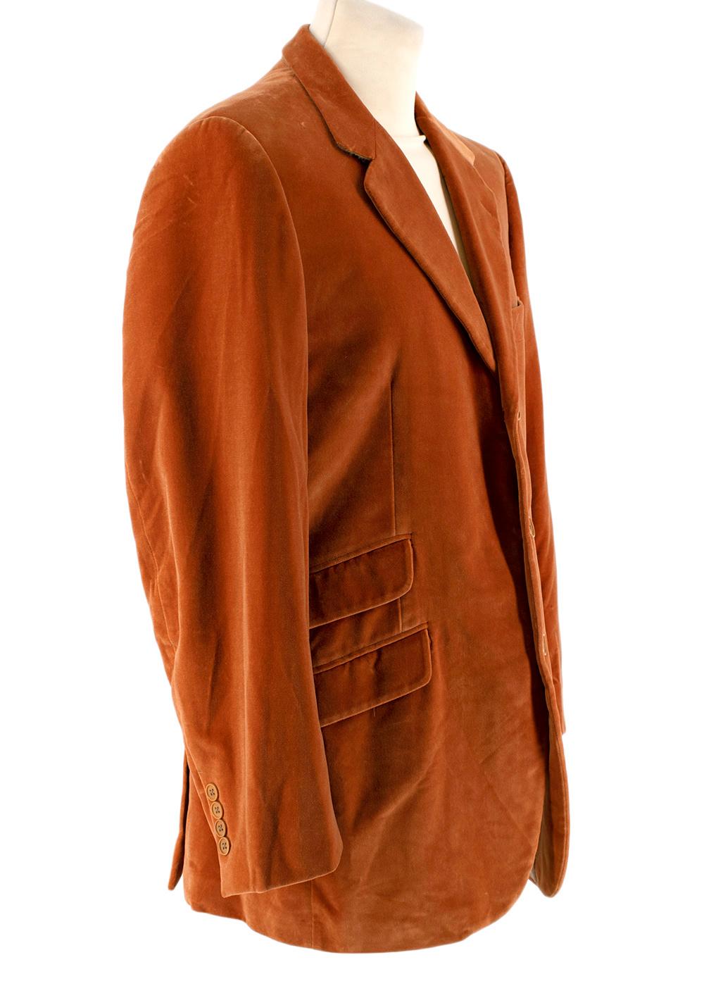 Yves Saint Laurent Orange Cotton Velvet Single Breasted Suit

-Made of soft luxurious cotton velvet 
-Warm orange hue 
-Single breasted classic cut 
Jacket:
-4 pockets to the front 
-4 insere pockets 
-Fully lined 
-Button fastening  to the front