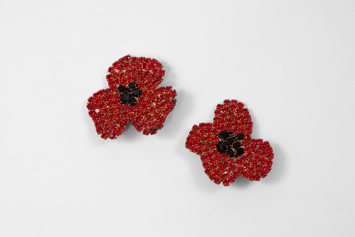 Bloom your ears with this delightful vintage YSL red and black crystals anemone clip-on earrings. Signed 