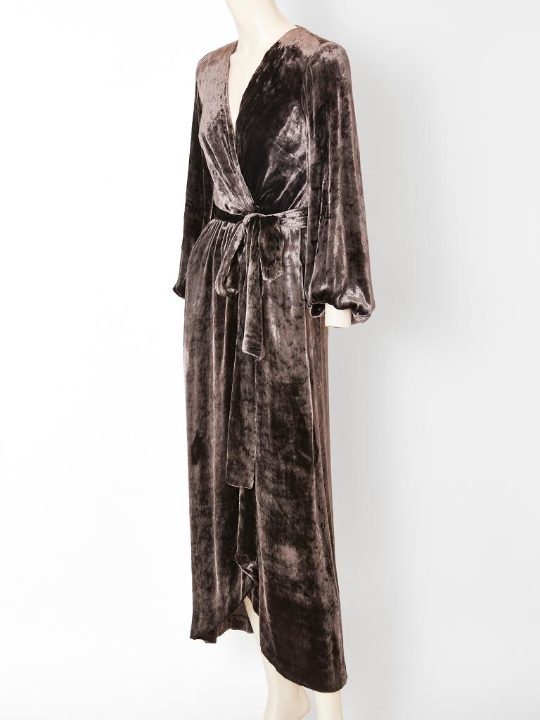 Yves Saint Laurent, rive gauche, dark taupe, long sleeve,  deep V neck, panné velvet, wrap  gown, with a tie at the waist. 