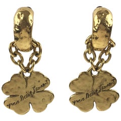 Yves Saint Laurent Paris Gilt Metal Clip on Earrings with Dangling Charm