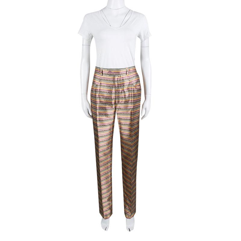 Yves Saint Laurent Paris brings you this pair of pants that are high in style and comfort. It is made of quality silk and designed in a high waist style with front fastening and brocade detailing in stripes all over. It will look just right with a