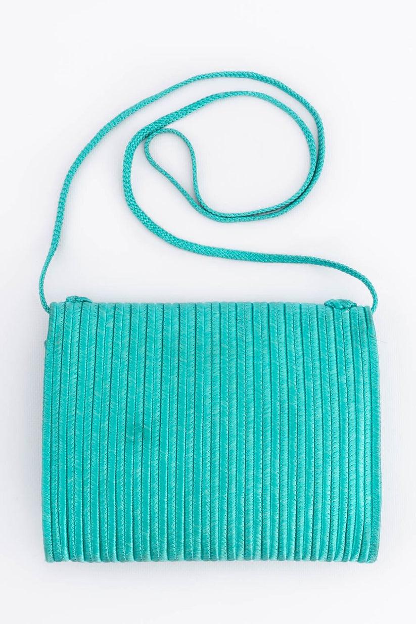 Yves Saint Laurent (Made in France) Passementerie bag.

Additional information: 

Dimensions: 
Length: 20 cm (7.878