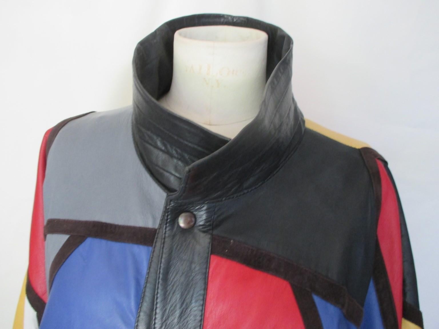 -COLLECTORS ITEM-
This rare vintage 1980's Yves saint Laurent leather coat is made in Piet Mondrian style.

We offer more exclusive vintage items, view our frontstore.

Details:
Made of soft leather in patchwork with 4 press buttons at the front and