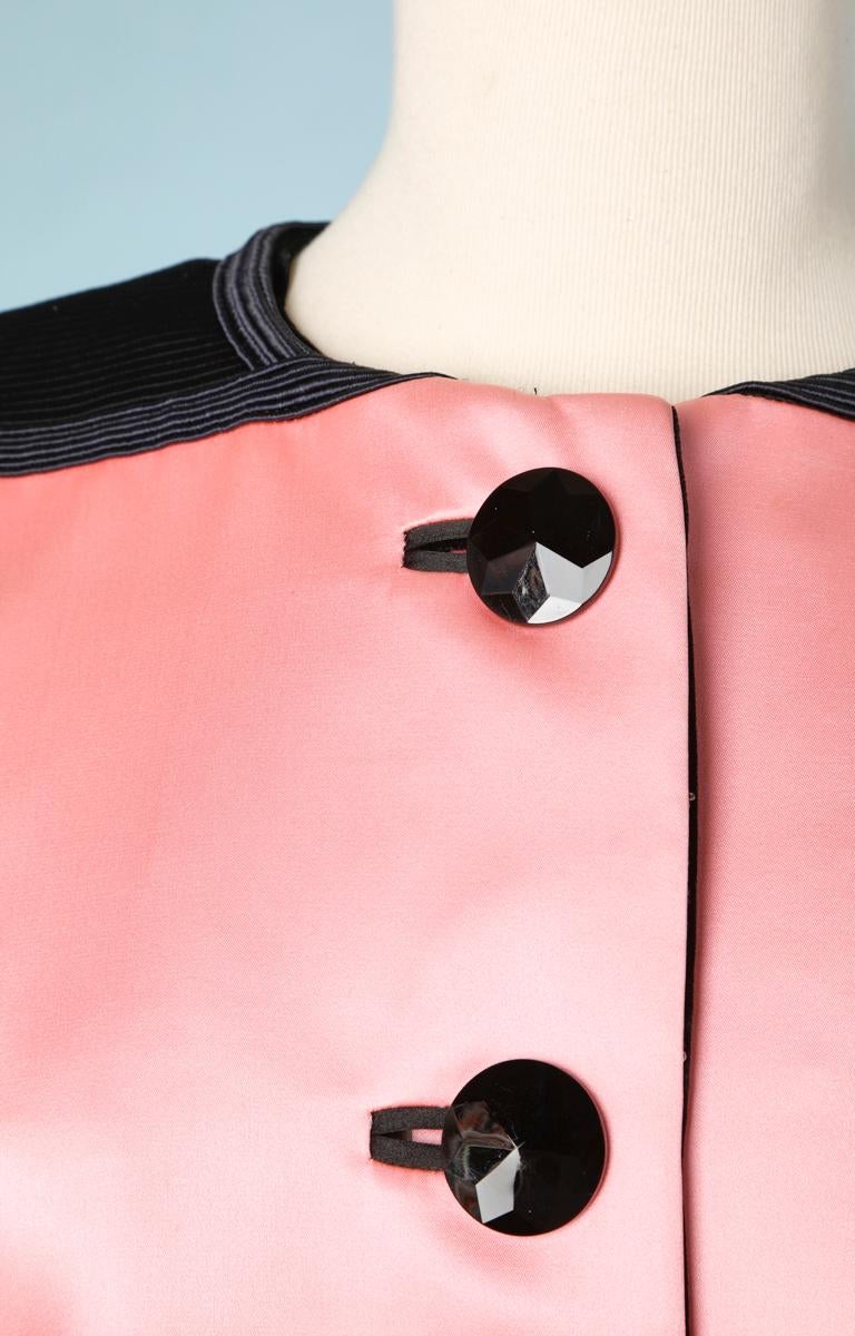Iconic, 1988 Yves Saint Laurent Rive Gauche branded jacket in pink silk satin and black striped satin, long sleeves with black piping and faceted black glass buttons, shoulder pads, X-shaped front yoke in pink silk satin, without collar but piping