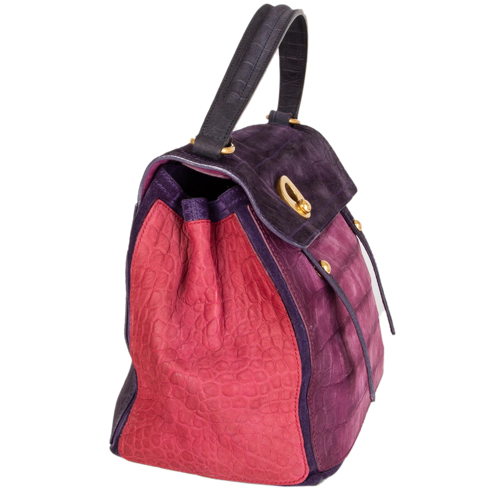 Yves Saint Laurent 'Muse 2' medium shoulder bag in purple, fuchsia, midnight blue and burgundy croco embossed nubuck leather.  Full-size buttoned pocket on the back. Lined in purple suede with a full-size zipper pocket in the middle. Has been