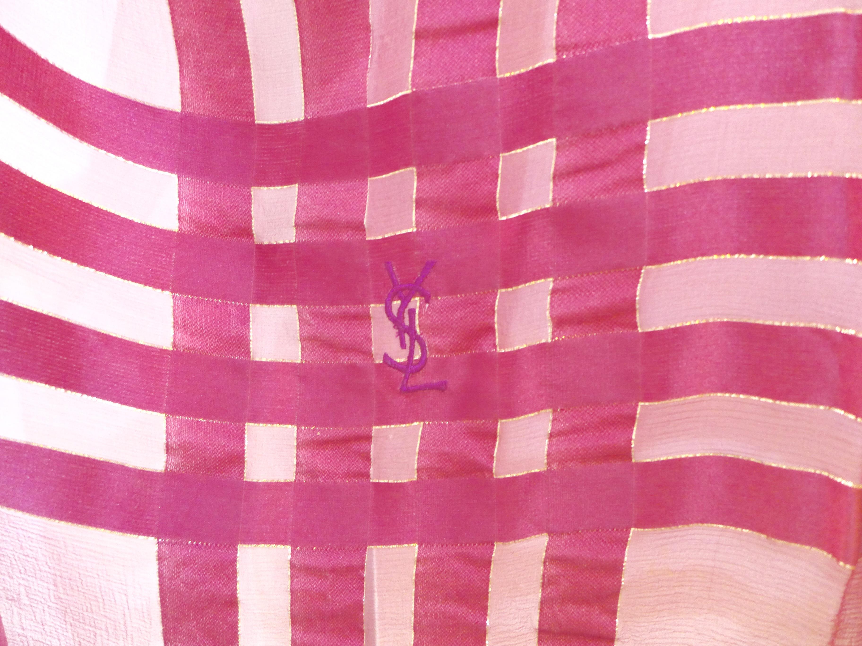 Made in France of pure silk and finished by hand with finely rolled hand-stitched edges, this eye-catching YSL scarf is 48