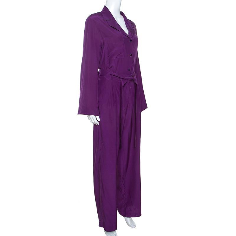 Creations from Yves Saint Laurent have something special about them just like this amazing jumpsuit! This purple jumpsuit features a comfortable shape and a belt at the front. It flaunts a buttoned front and long sleeves. It comes equipped with