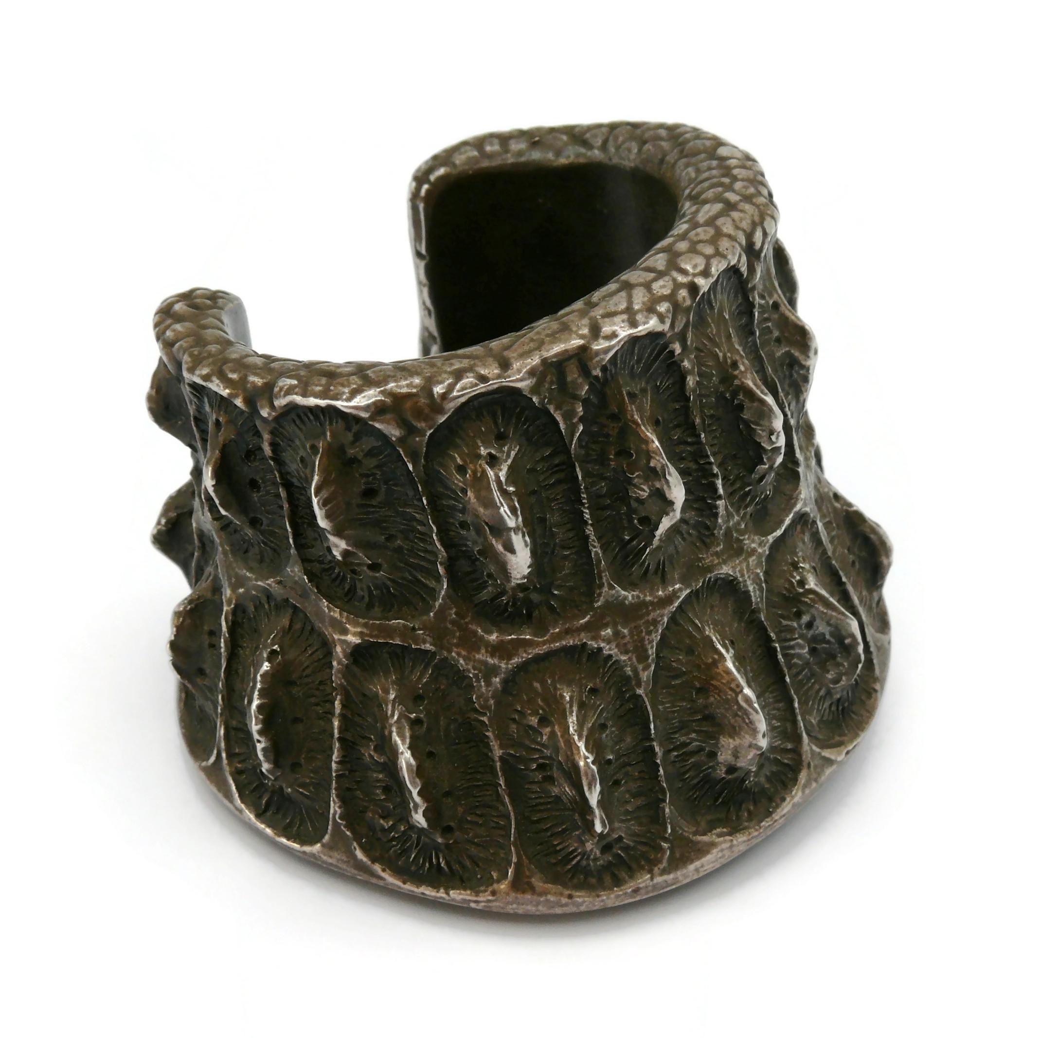 YVES SAINT LAURENT Rive Gauche rare vintage antiqued silver tone cuff bracelet featuring a 3-dimensional crocodile scale design.

Embossed YVES SAINT LAURENT RIVE GAUCHE Made in France.

Indicative measurements : inner measurements approx. 5 cm x 4