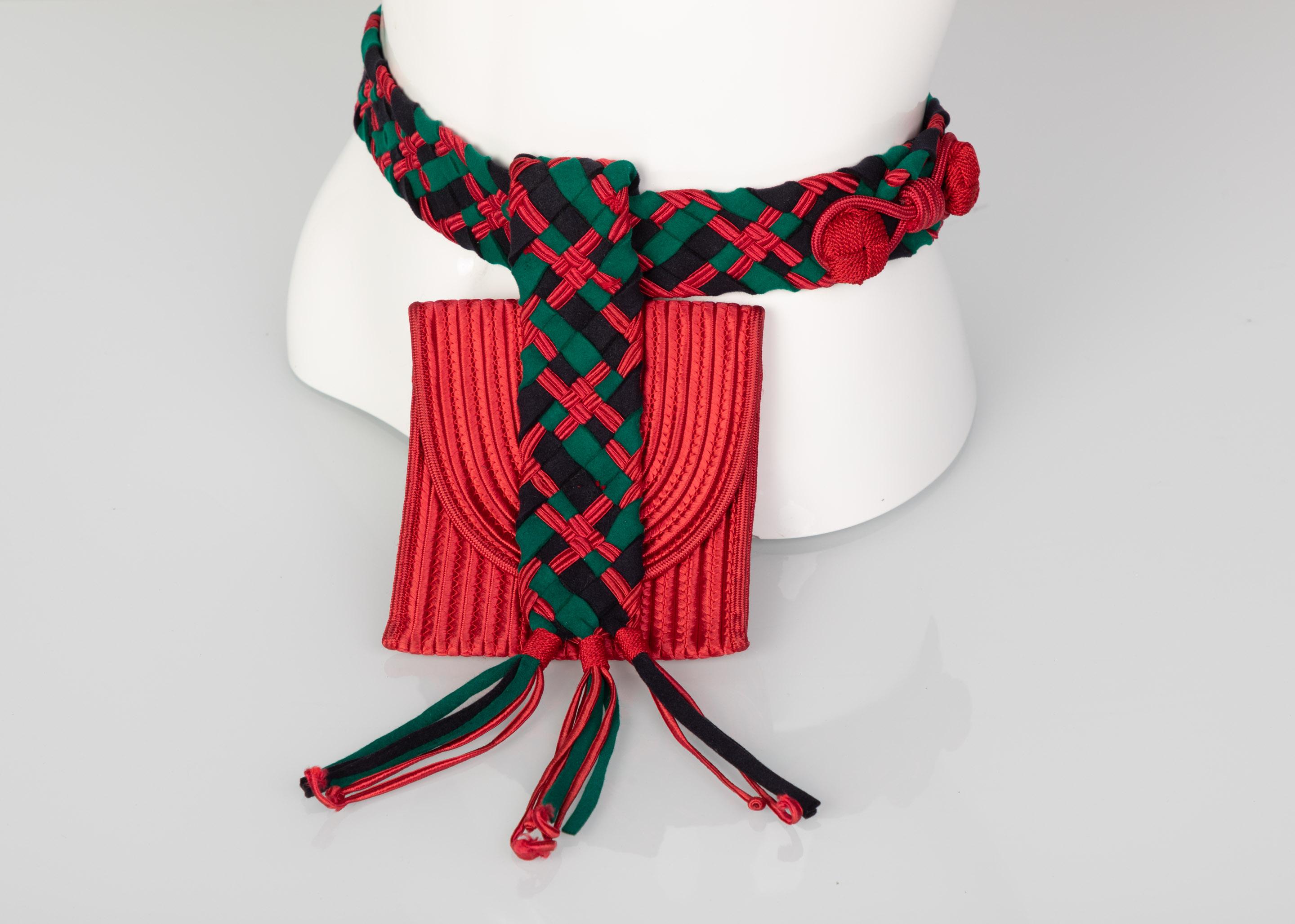 Passementerie accessories are a staple to early YSL collections. The craftsmanship of these designs allows for an exciting way to bring together interesting color combos and provides a simple way to elevate an ensemble. This 1990s YSL belt bag is