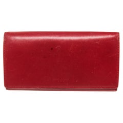 Langes Yves Saint Laurent-Lederwandband aus rotem Leder mit materialbezogenem Leder, goldfarben