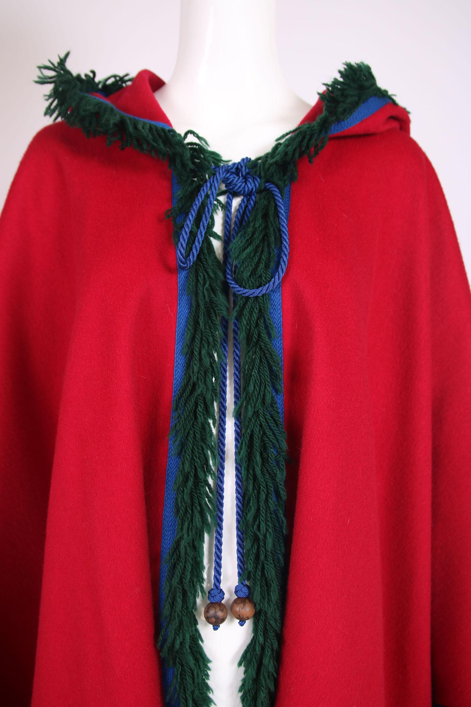 Women's or Men's Yves Saint Laurent Red Wool Hooded Cape w/Blue Trim & Green Fringe 1970's For Sale
