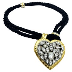 Yves Saint Laurent rhinestones heart hanging  from a double black cord, 1990's