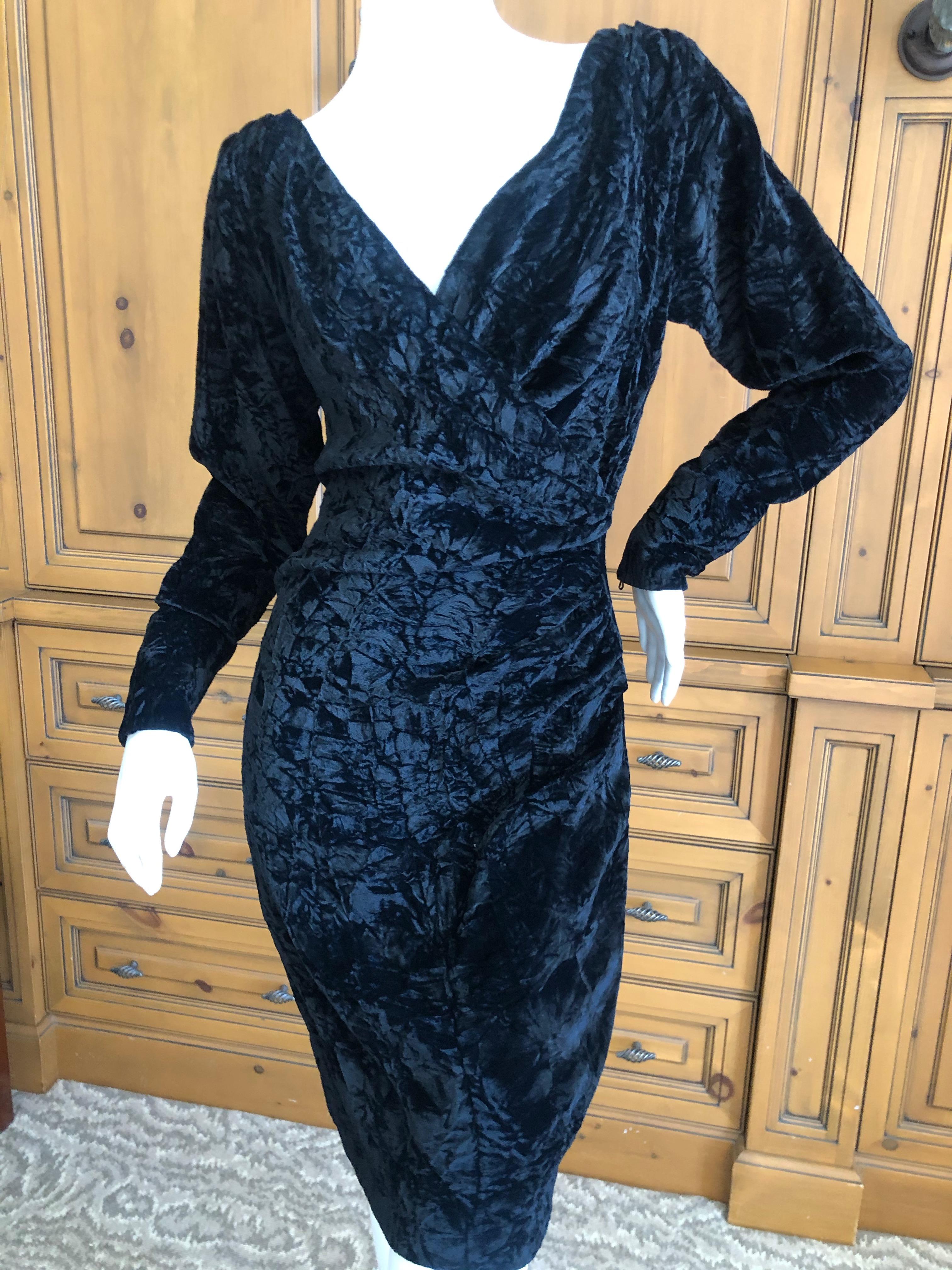 Yves Saint Laurent Rive Gauche 1970's Low Cut Black Velvet Cocktail Dress
This is aso pretty, the photo's don't quite capture it's details.
Please use the zoom feature to see details.
Size 38
Bust 36