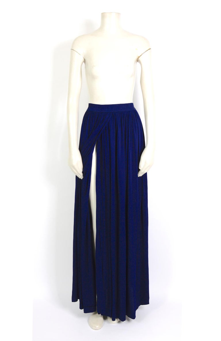Vintage 1970s vintage Yves saint Laurent rive gauche long bleu silk jersey skirt or dress. 
French size 38
The waist is elastic, unstretched to stretched measurements are taken flat:
Underarm to Underarm unstretched 12inch/31cm(x2) - stretched