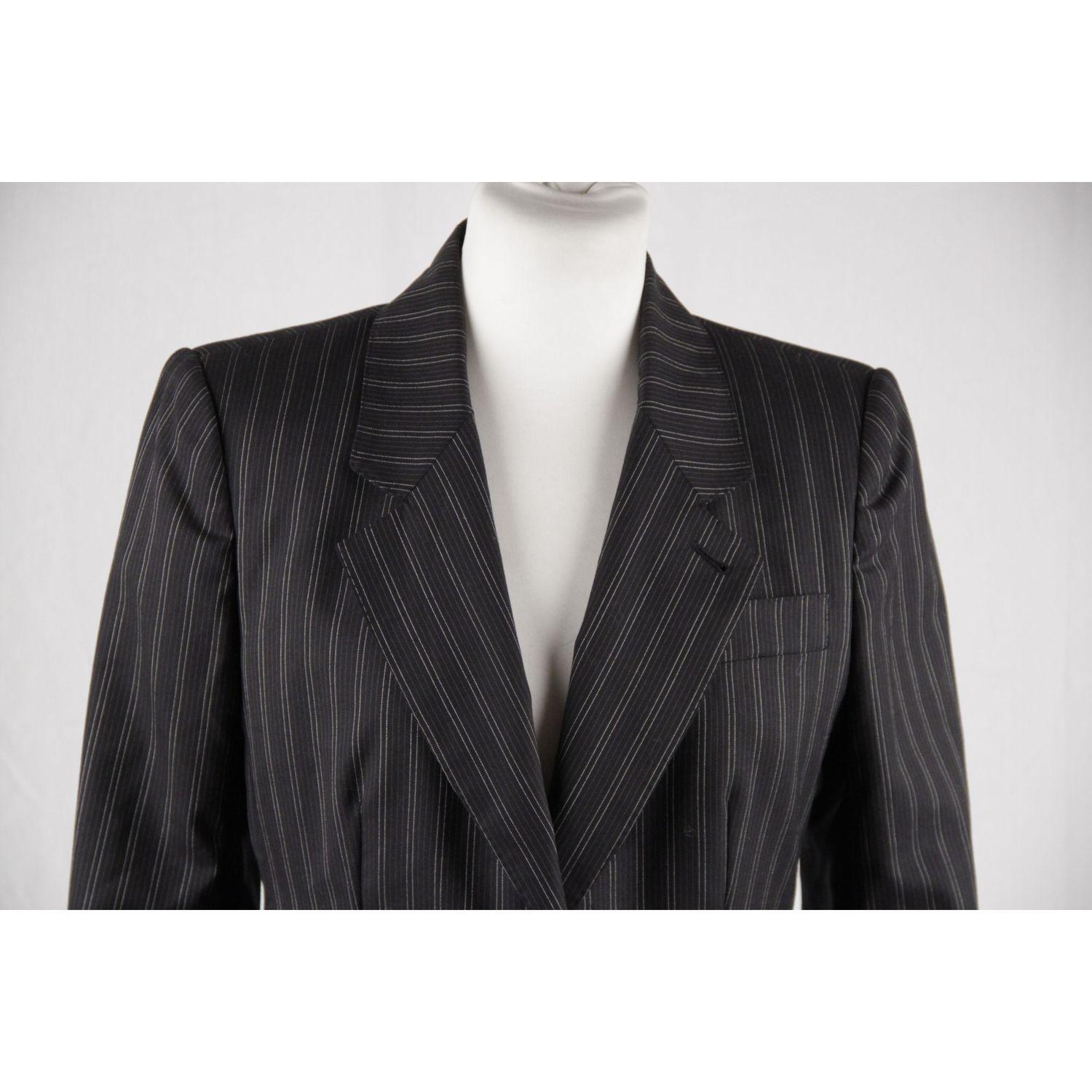 Yves Saint Laurent Rive Gauche Black Pinstriped Blazer Jacket Size 38

MATERIAL: Wool 
COLOR: Black 
MODEL: Blazer 
GENDER: Women 
SIZE: Small 
COUNTRY OF MANUFACTURE: Italy 

Condition CONDITION DETAILS: B :GOOD CONDITION - Some light wear of use -
