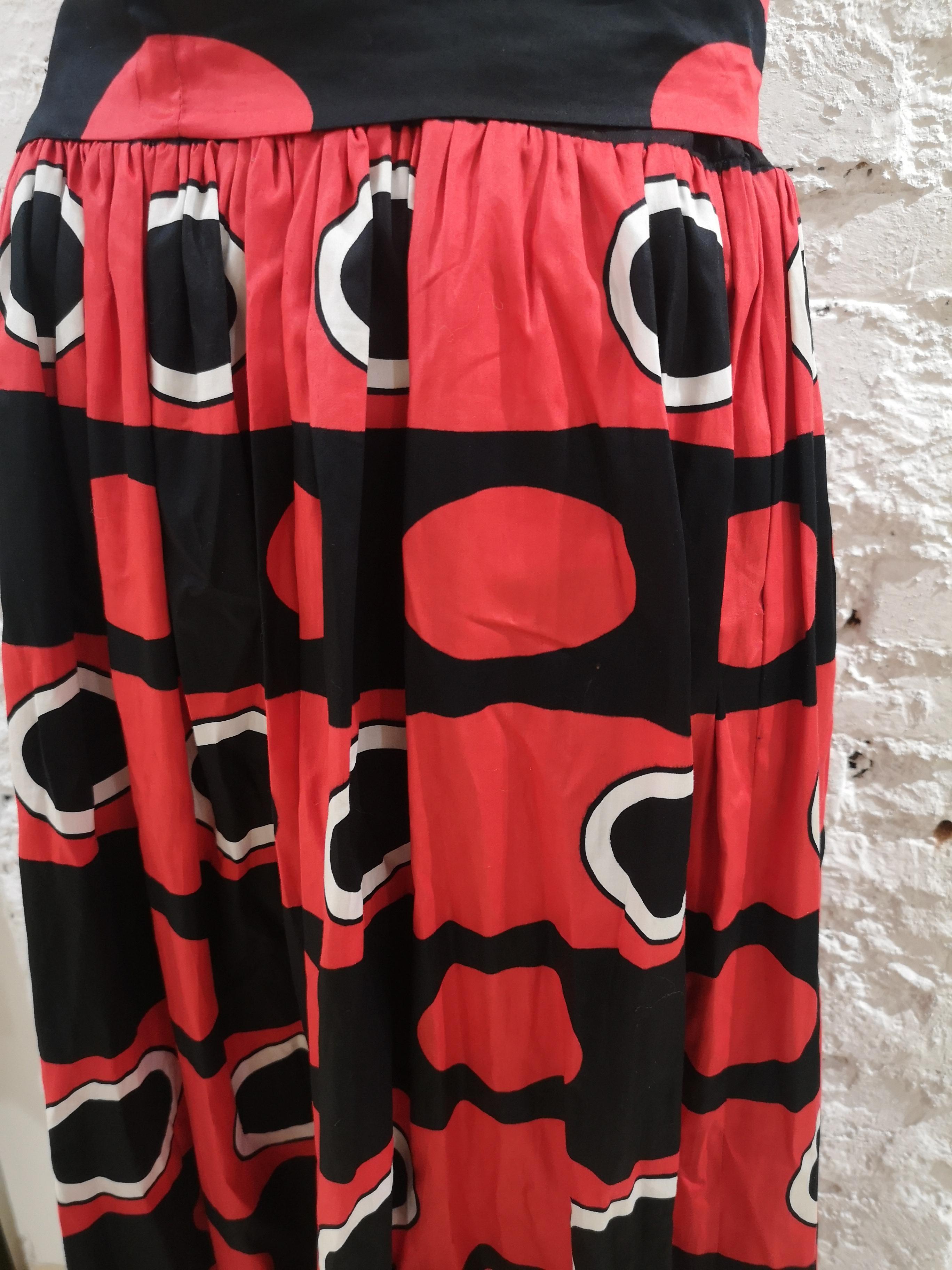 Yves Saint Laurent Rive Gauche black red white long Skirt
Really one of a kind red and black skirt totally made in France
in size M 
high waist skirt
total lenght 105 cm
waist 74 cm