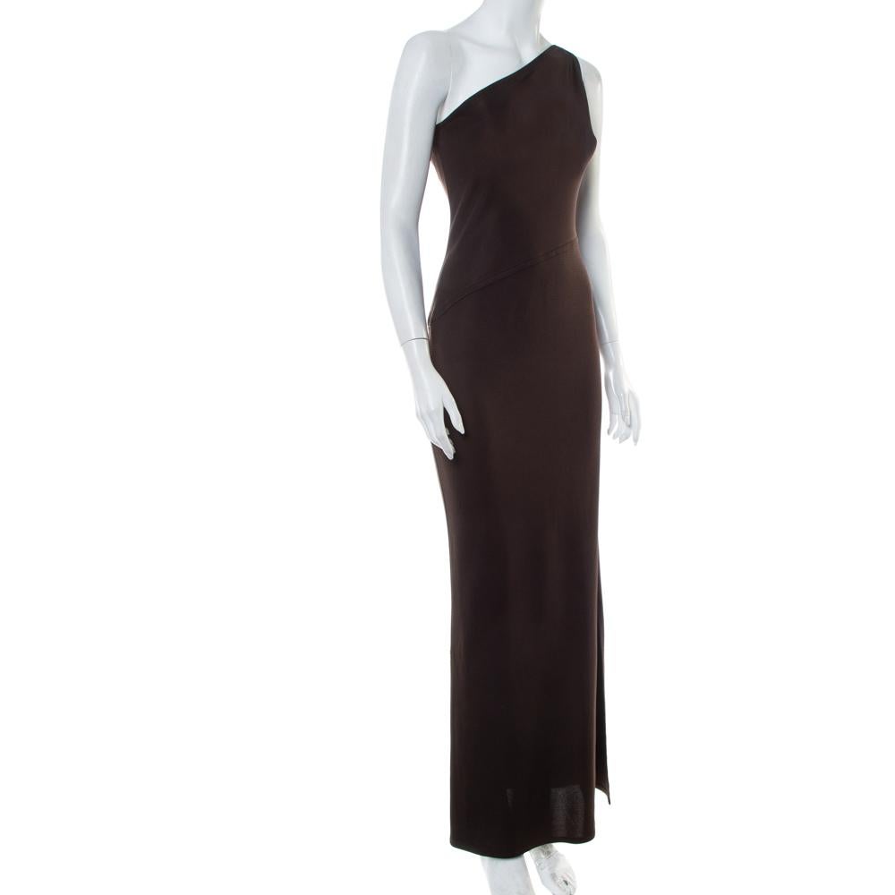 This timeless dress from the house of Yves Saint Laurent is a staple that can be dressed up or down. An appealing number like this brown-hued maxi dress requires no effort to look stylish. It has a one-shoulder style, a fitted silhouette, zip