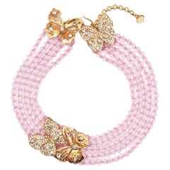 Yves Saint Laurent Schmetterling-Halskette mit rosa Perlen