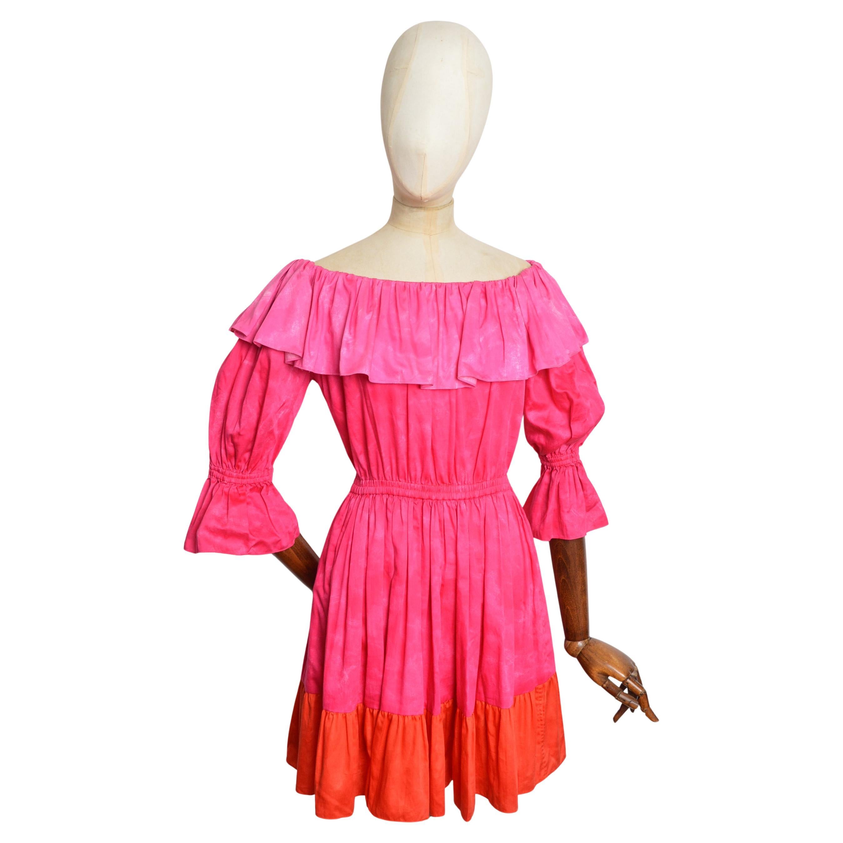 Who designs Yves Saint Laurent menswear?