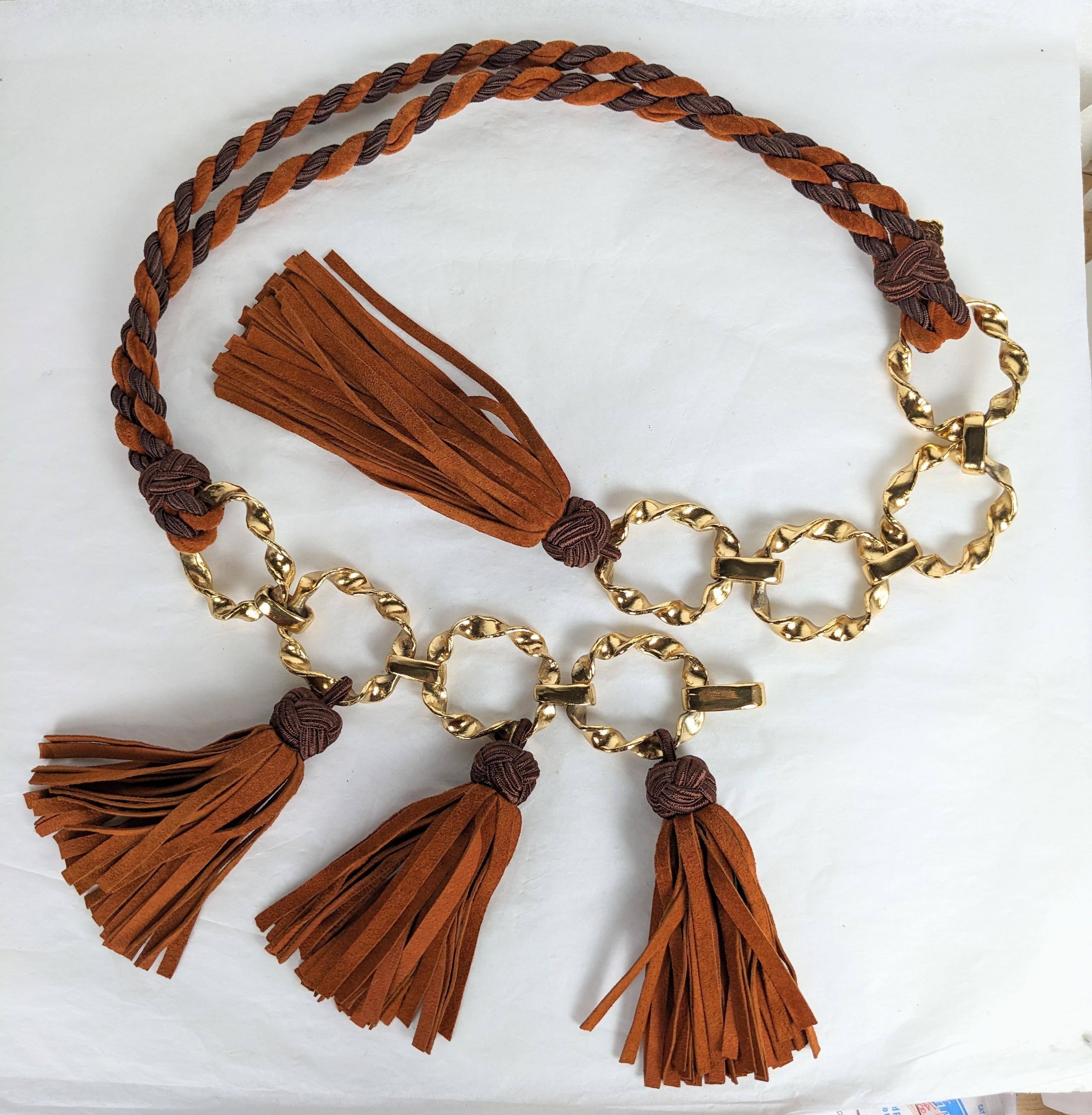 Yves Saint Laurent Rive Gauche chain belt. Composed of rust brown braided suede, purple silk passementerie woven cord and round gilt plate round twisted links. Further decorated with Chinese inspired passementerie and suede tassels. Excellent