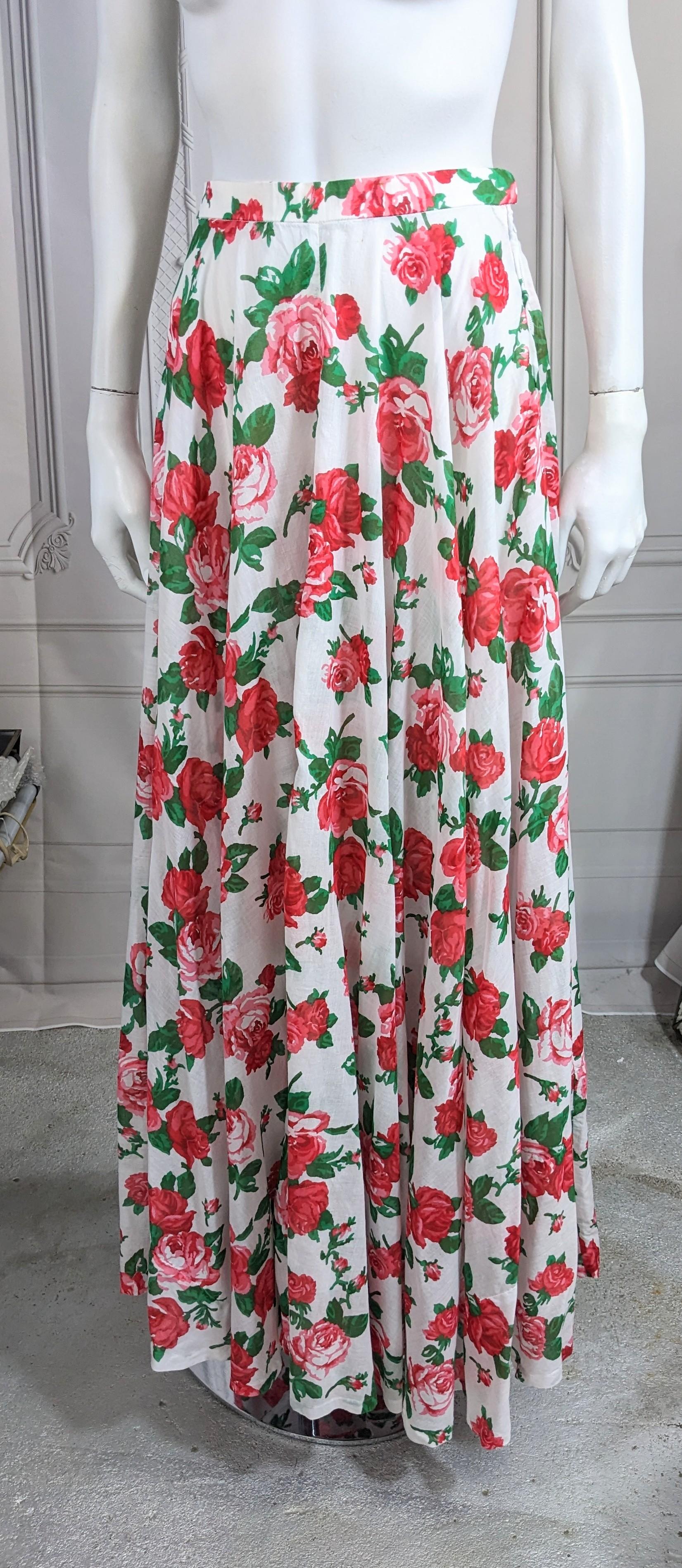 Rare Yves Saint Laurent Rive Gauche Early Halter Ensemble in Boussac Rose printed cotton batiste. A super full floor length circle skirt is paired with a wrap halter top. An additional belt is included for use in hair or other styling purposes. The