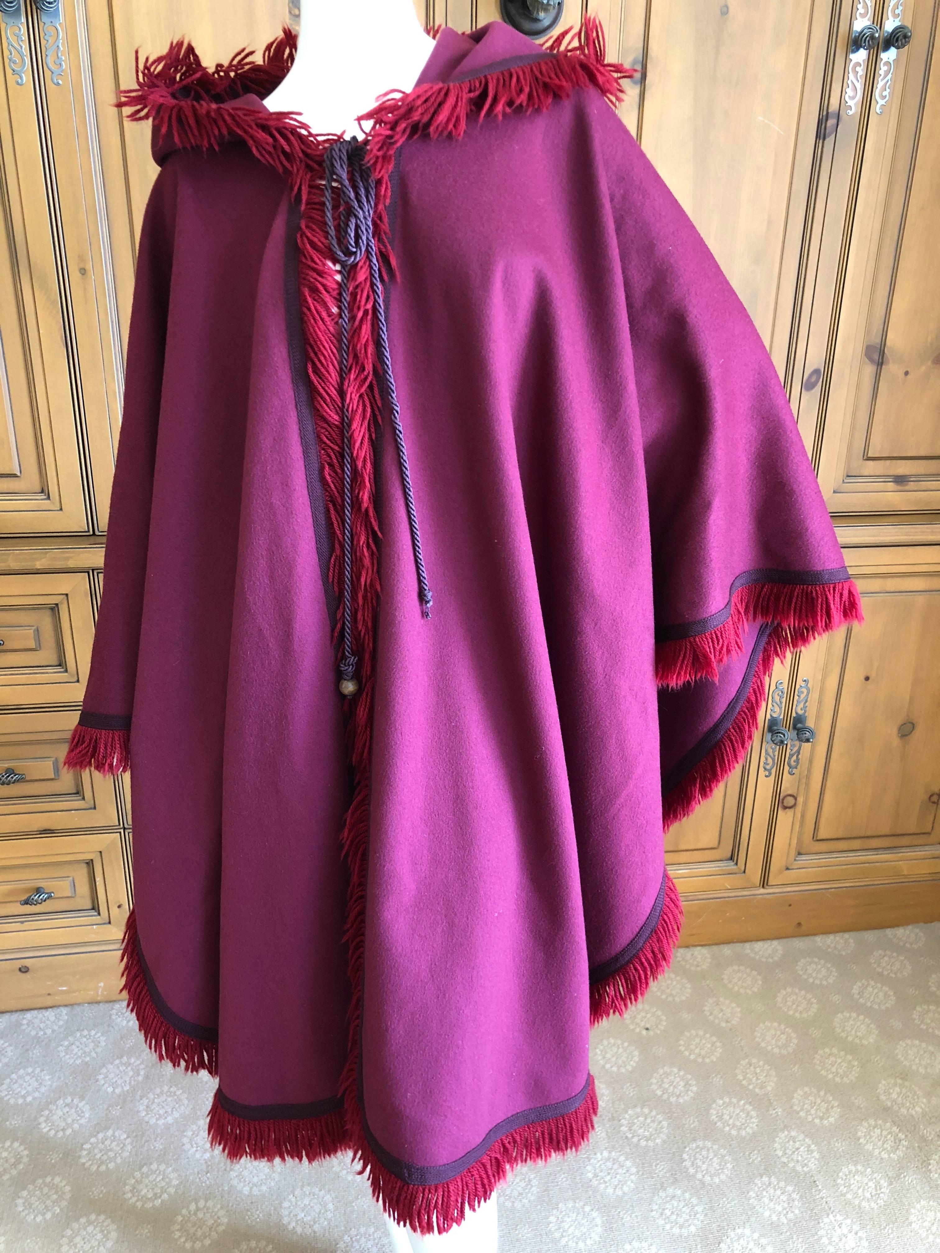 Yves Saint Laurent Rive Gauche Fringed Fuchsia Cape with Hood and Tassel In Excellent Condition For Sale In Cloverdale, CA