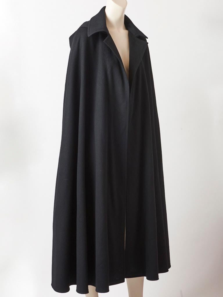 Yves Saint Laurent, Rive Gauche, wool, maxi cape  with attached hood and pointed collar. Hood is lined.
C. 1970's.