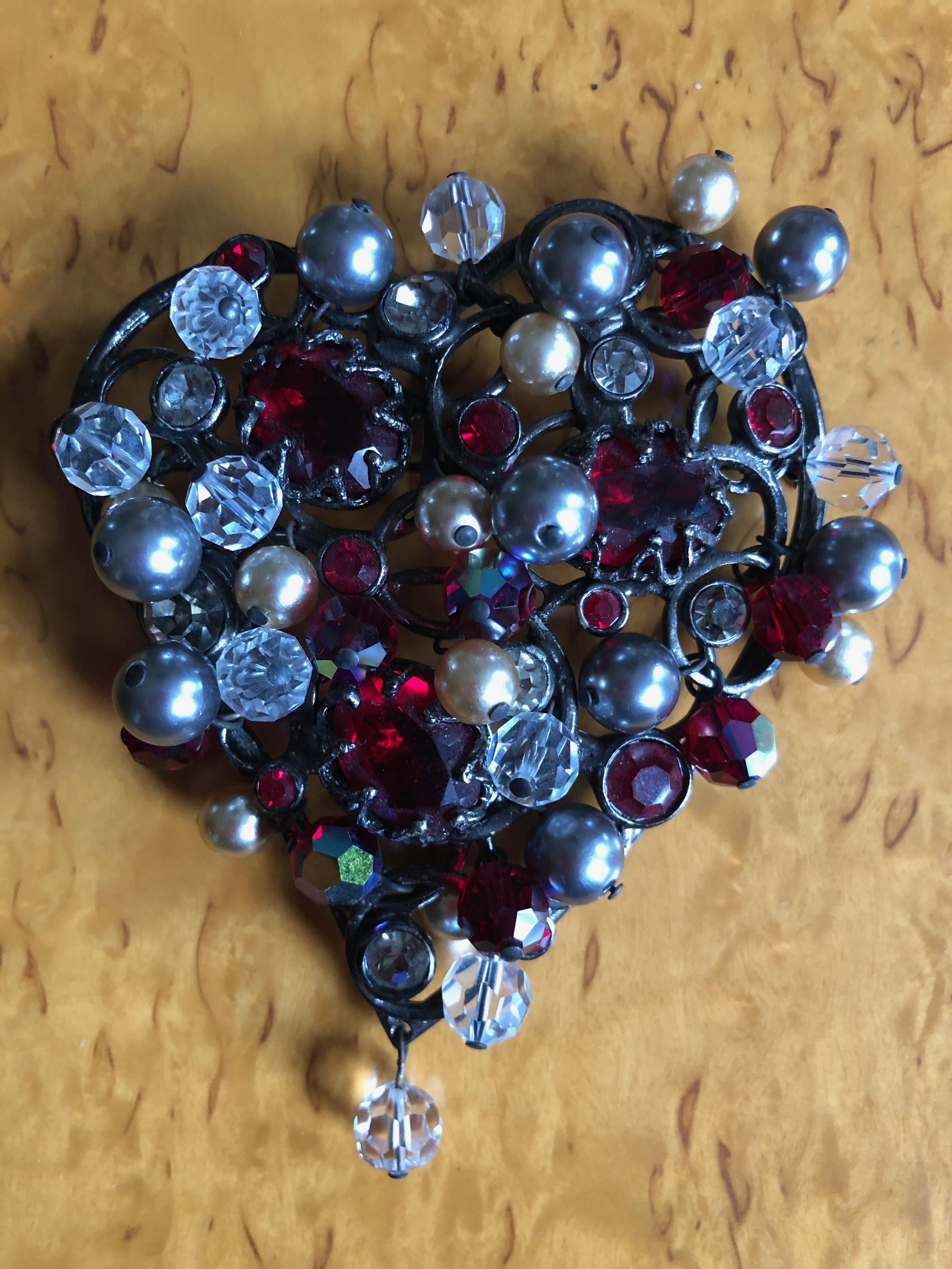 Yves Saint Laurent Rive Gauche Large Heart Pin Brooch with Tremblant Beads
Crystal set in antique gunmetal tone metal with lot's of crytsal's that trembel and move.
There is a hook on the back to attach to pearls or a chain to wear as a
