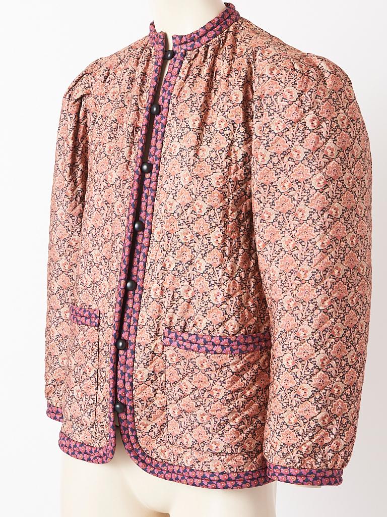 Yves Saint Laurent, Rive Gauche silk shantung, floral, Liberty print quilted jacket, having no collar, deep patch pockets and a contrasting floral print trim detail. C. late 70's.
