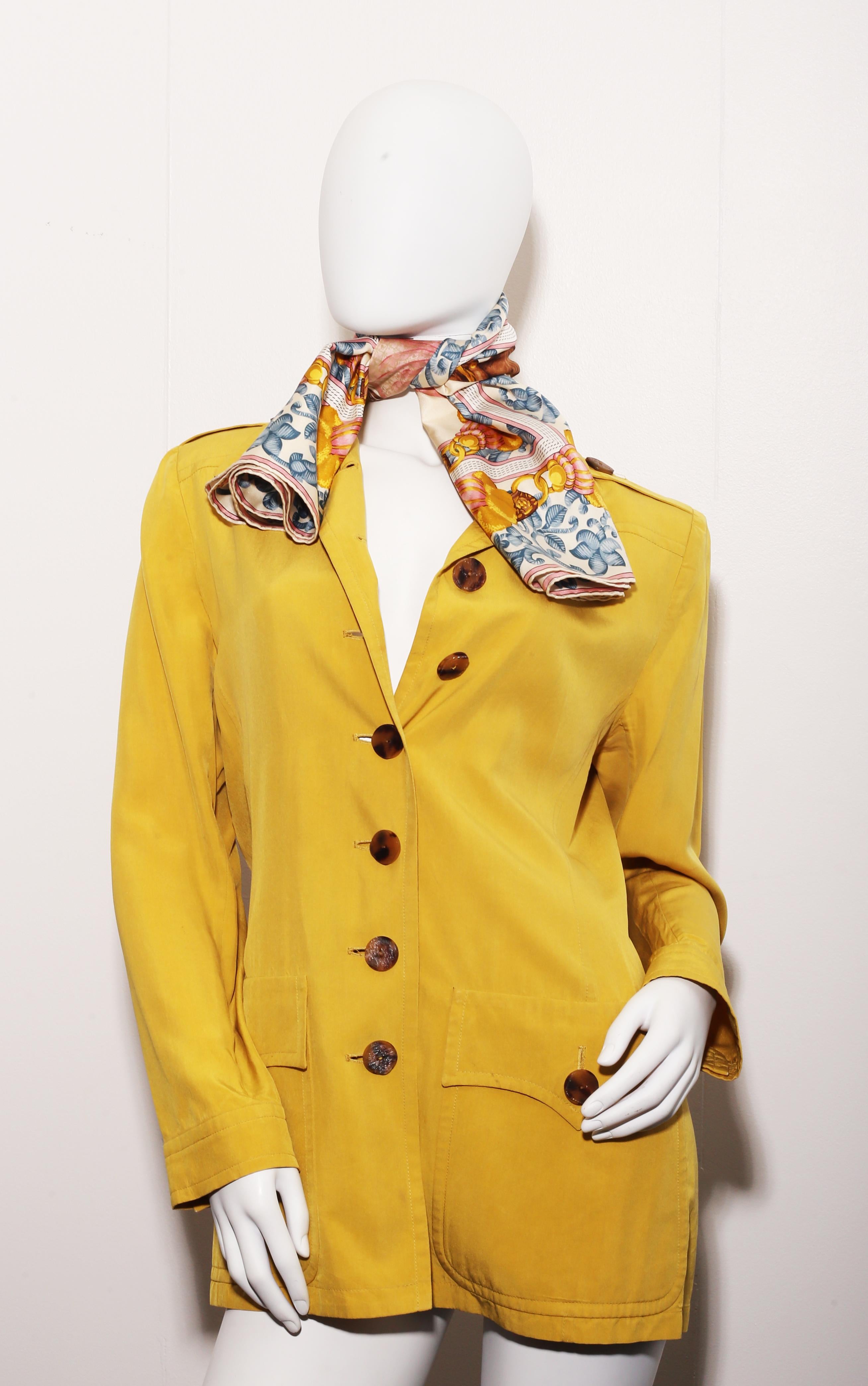 Yves Saint Laurent Rive Gauche pale chartreuseSafari  jacket,circa 1990
brushed cotton,  safari jacket with epaulettes and wood buttons. 
This jacket may be worn in a number of ways and styled to your liking. Easily dress this piece up or down, it