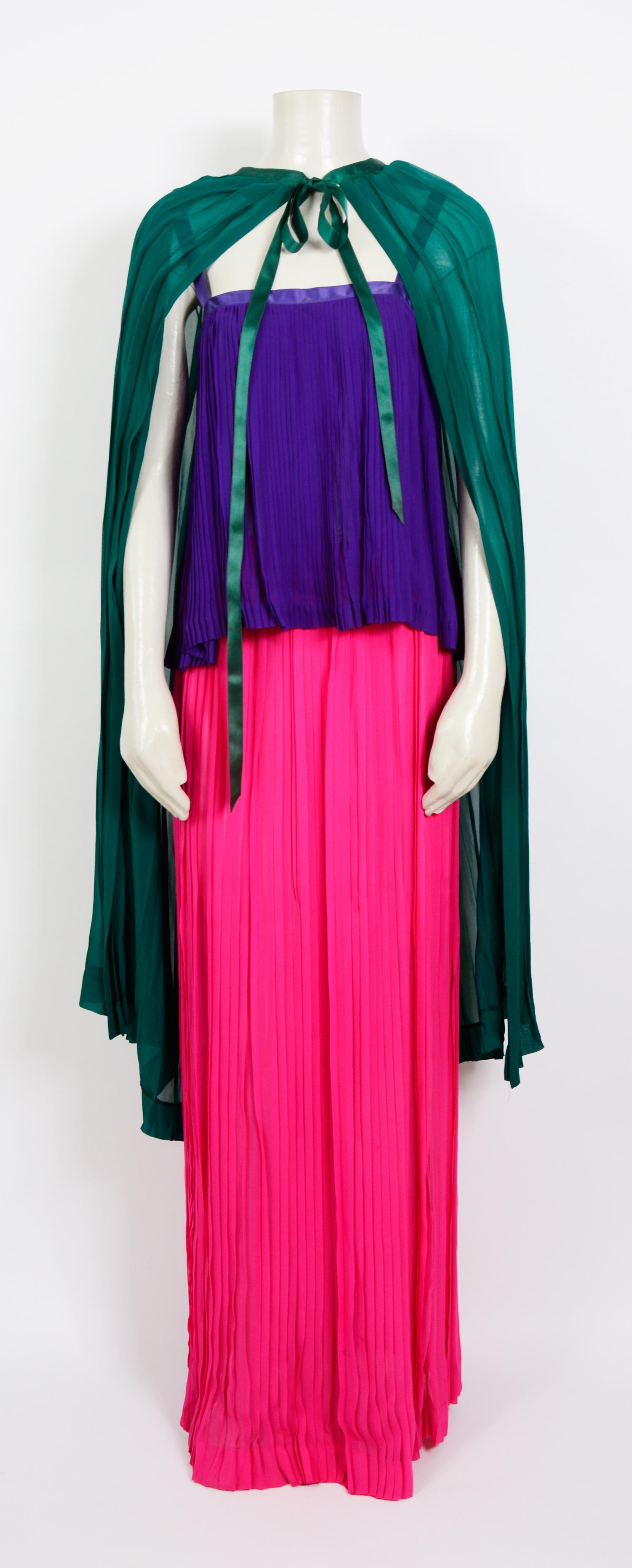 Stunning!! Yves Saint Laurent documented Spring-Summer 1979 three-piece set, 
This 70's runway Yves Saint Laurent Rive Gauche features a pleated silk chiffon top with an elasticated maxi skirt + a matching max wrap overskirt that can also be worn as