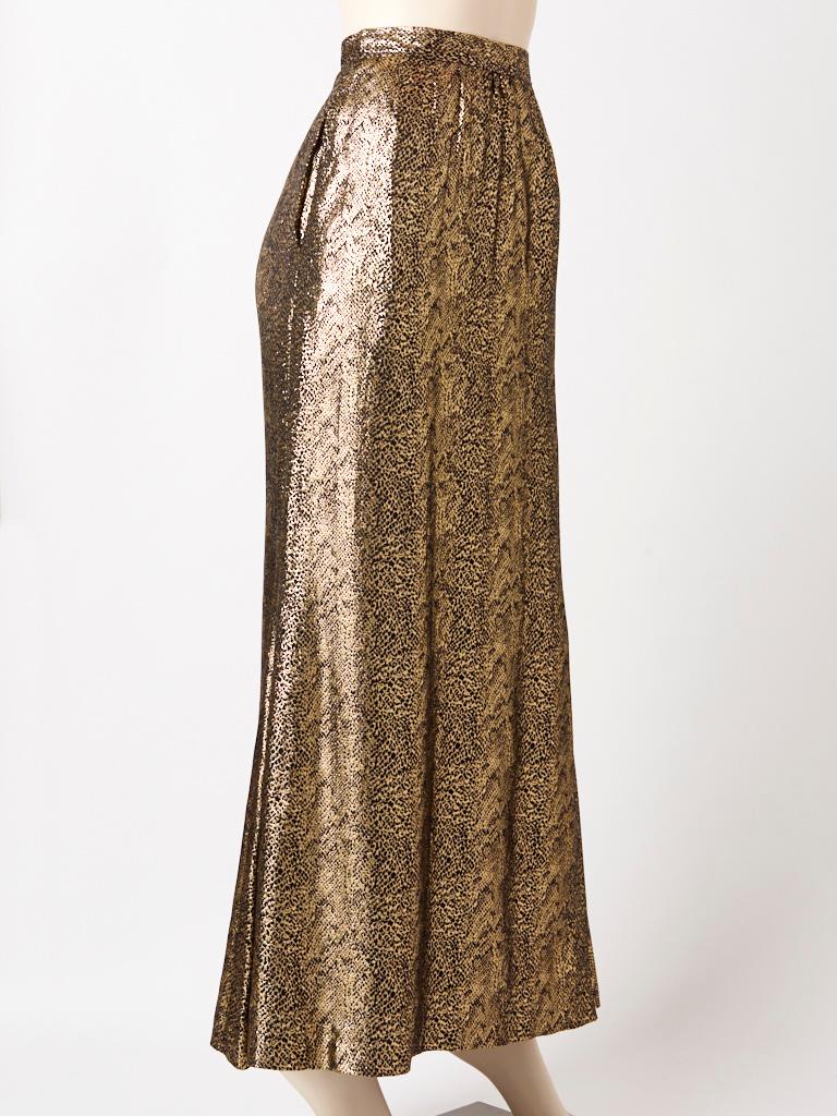 Yves Saint Laurent, Rive gauche, long, evening skirt, in a reptile pattern gold lame , having a slightly gathered waist, and hidden side pockets at the hip. 