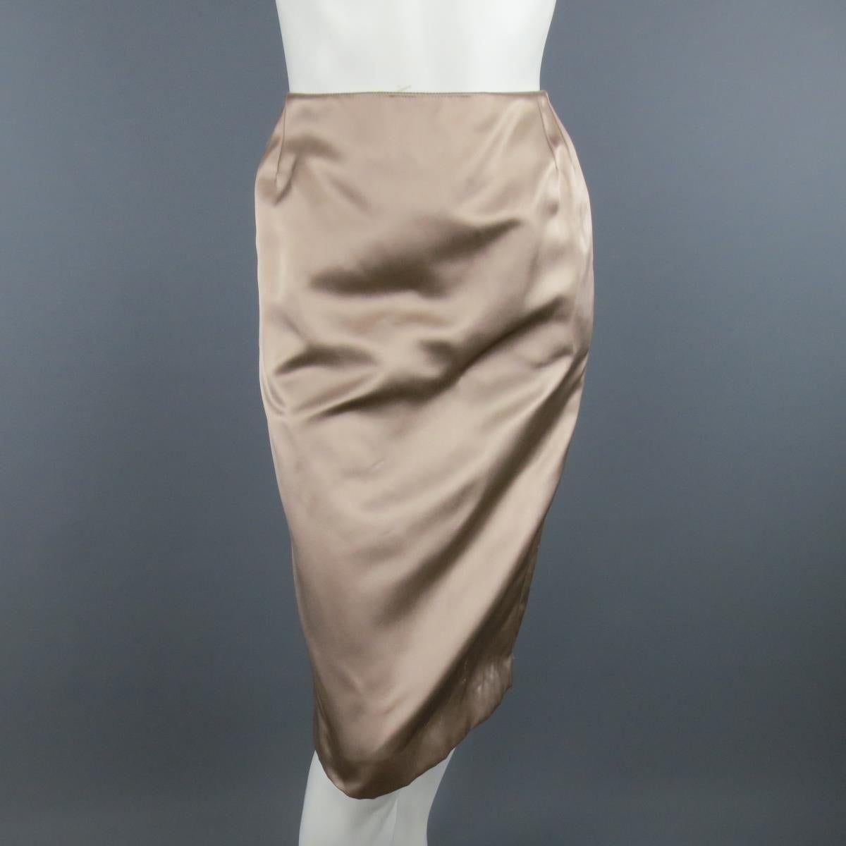 Archival YVES SANT LAURENT Rive Gauche by Tom Ford suit comes in nude beige silk satin includes a three button jacket with pointed lapel, flap pockets, satin buttons, and zig zag stitch hem details throughout with a matching pencil skirt.
 Made in